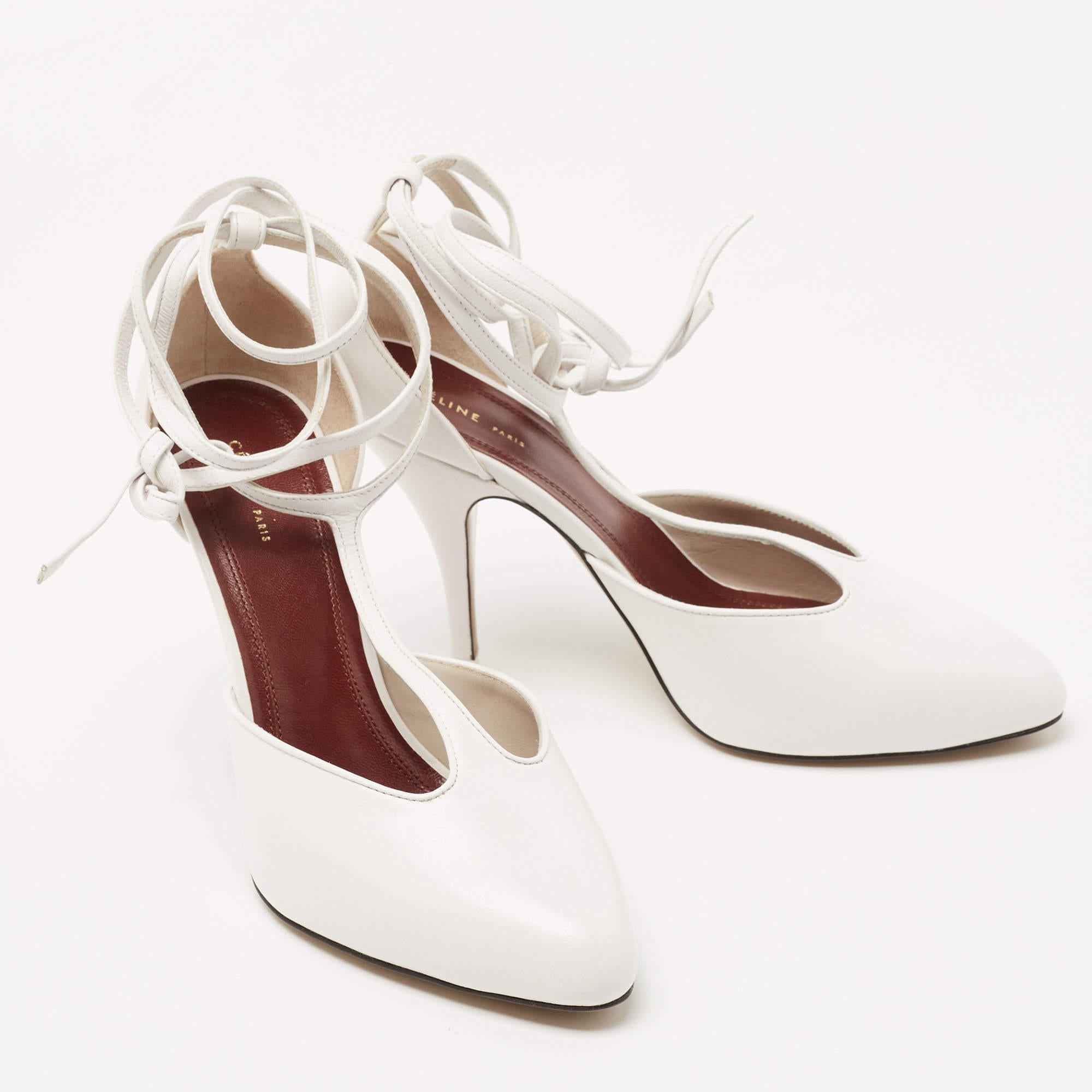 Pair that feminine dress of yours with these stunning Celine sandals and get set to get never-ending compliments! These white sandals are crafted from leather and feature an almond-toe silhouette. They flaunt a T-strap design with ankle