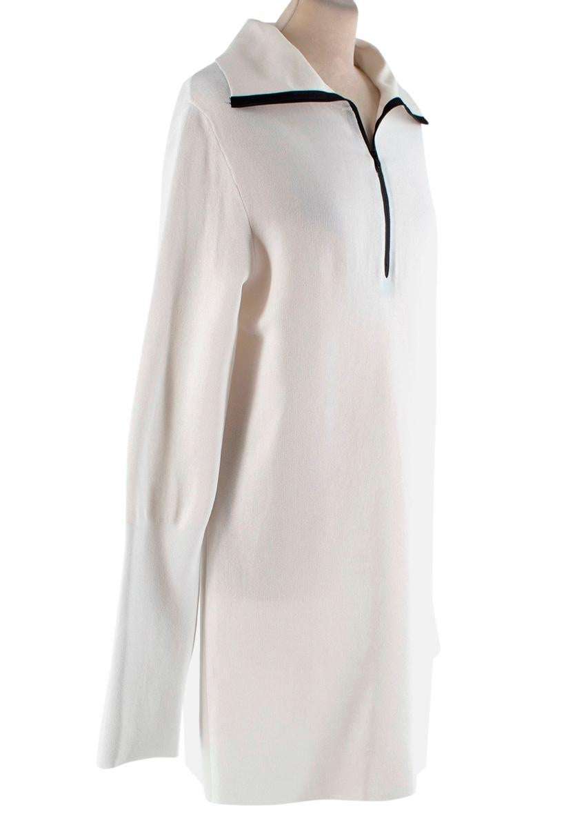 Celine White Silk Blend Contrasting Zip High Neck Dress

- Celine by Phoebe Philo 
- Made of a silk blend knit 
- Contrasting zip details to the front 
- Oversized sleeves
- Classic high neck cut 
- Neutral easy to style hues
- Minimal timeless
