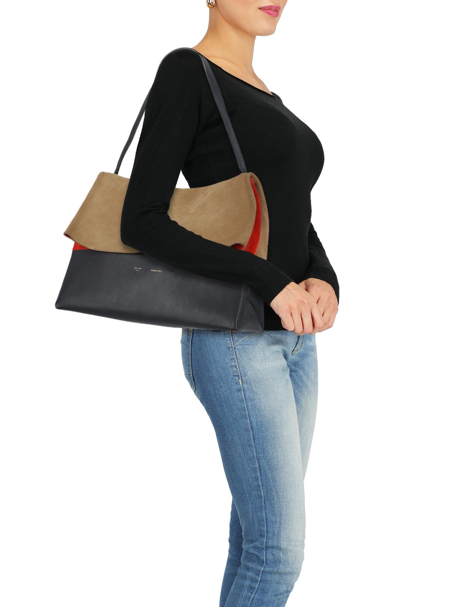All soft, leather, solid color, front logo, with flap, silver-tone hardware, main internal compartment, suede detail, day bag

Includes: N/A

Product Condition: Good
Lining: visible abrasion, prominent loose stitching. Hardware: visible pulled