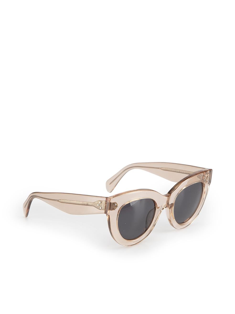 CONDITION is Good. Minor wear to sunglasses is evident. Light wear to the hardware within the acetate with discolouration on this used Celine designer resale item. These sunglasses come with original case with broken zip.



Details


See-through
