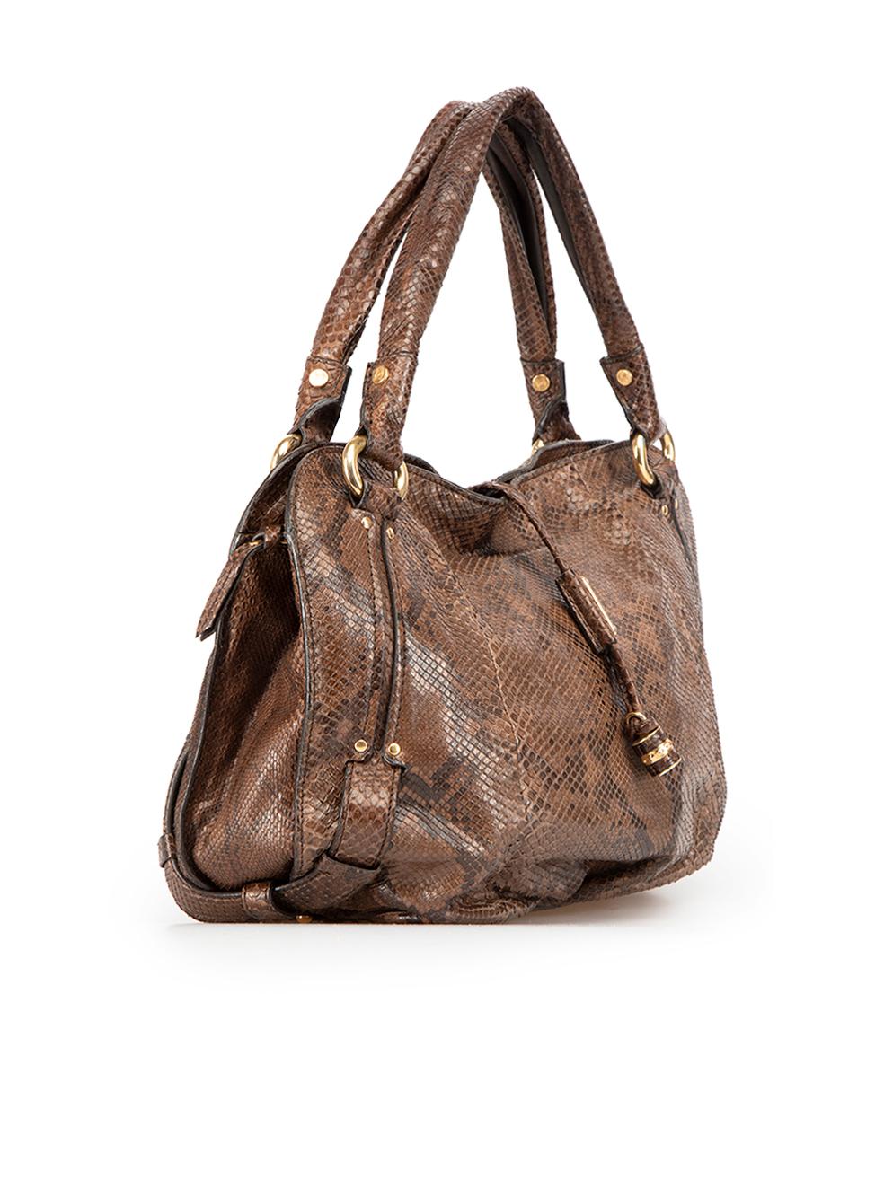 CONDITION is Very good. Minimal wear to bag is evident. Minimal wear to the base with small scuff marks and the hardware is starting to tarnish on this used Céline designer resale item.



Details


Brown

Snakeskin

Large tote bag

2x Top