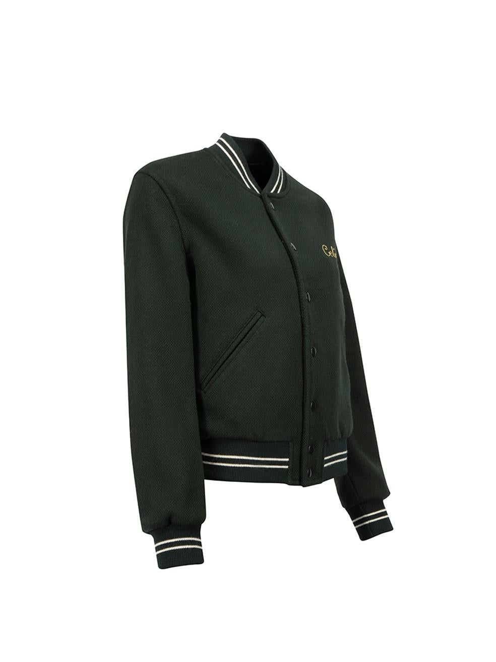CONDITION is Very good. Hardly any visible wear to jacket is evident. There a few scuffs to the finish of the buttons on this used Céline designer resale item. 
 
 Details
  Green
 Wool
 Varsity jacket
 Front snap buttons closure
 Striped accent