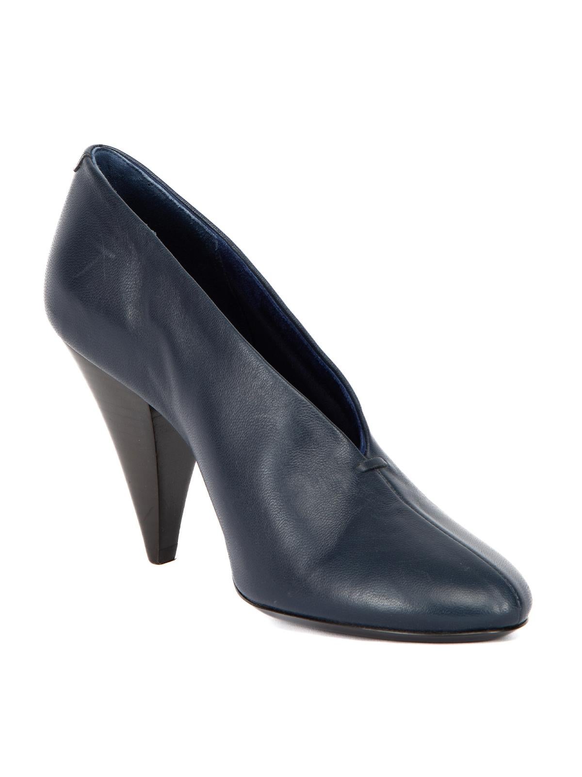 CONDITION is Very good. Hardly any visible wear to boots is evident apart from some very light scuffs on this used Celine designer resale item.  Details  Navy blue Leather Almond toe Boot like heel Slip on fastening Brand name on inner and outer