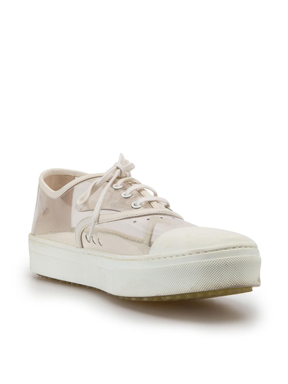 CONDITION is Good. Minor wear to shoes is evident. Light wear to soles with scuffing around both shoes, particularly at the toes and heel on this used Céline designer resale item. 



Details


White

Leather and PVC

Low top trainers

Lace