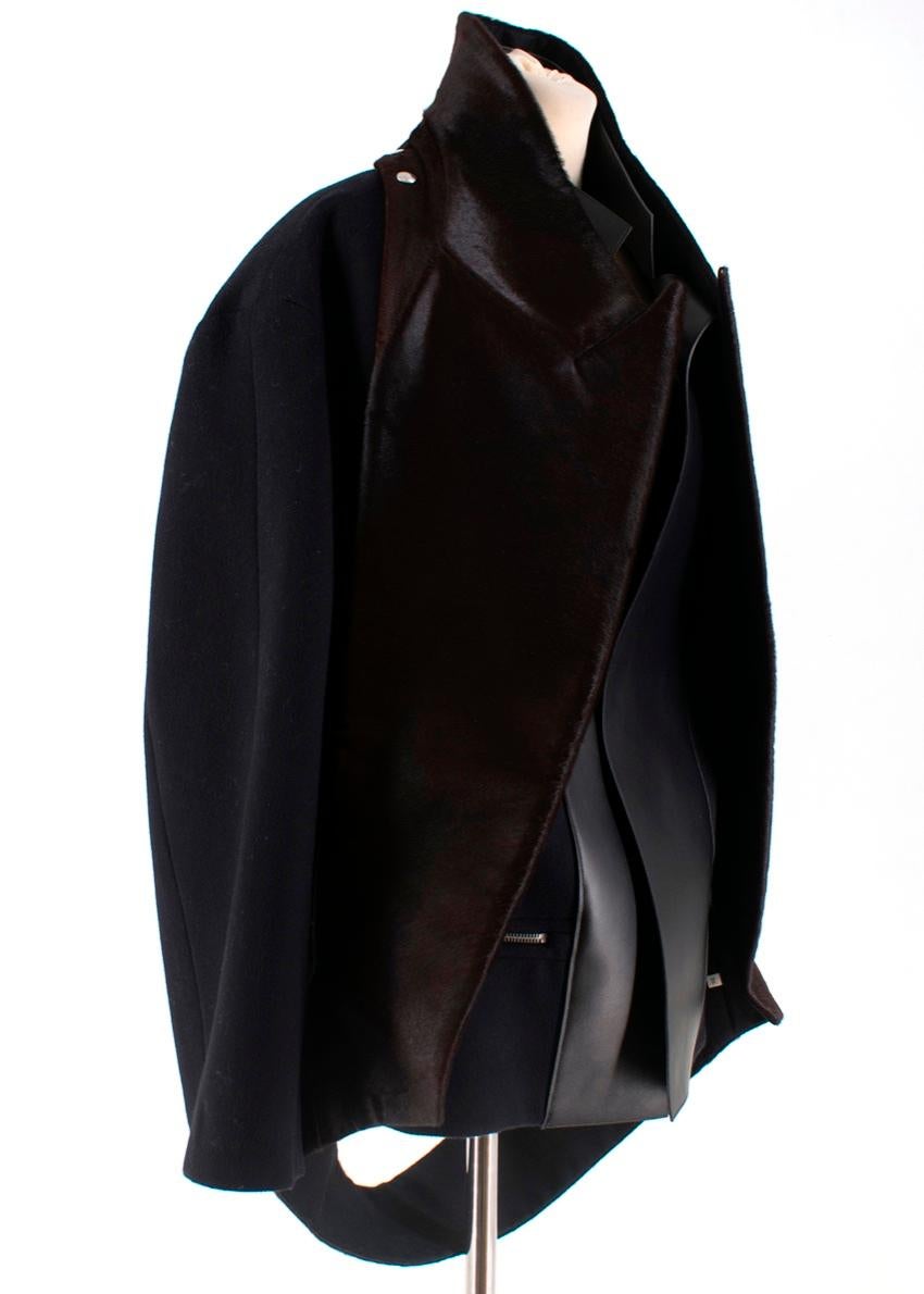 Celine Wool & Cashmere Blend Jacket with Leather and Fur Trim. 

- Removable, brown fur trim 
- Silver zippers and buttons 
- 90% Wool, 10% Cashmere 
- Inside: 100% Lamb
- Collar: 100% Lamb
- Lining: 100% Cupro
- Made in France

Please note, these