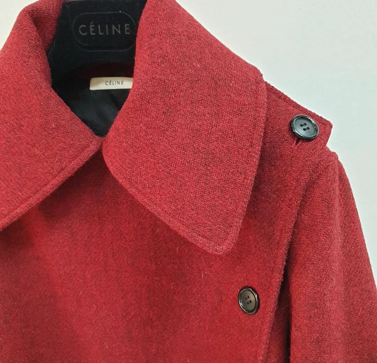     Est. retail price $3500
Celine Wool Fur Coat
    Red
    Colorblock Pattern
    Fur Trim & Stand Collar
    Long
    Flap Pockets & Button Closure
Sz.36
Very good condition