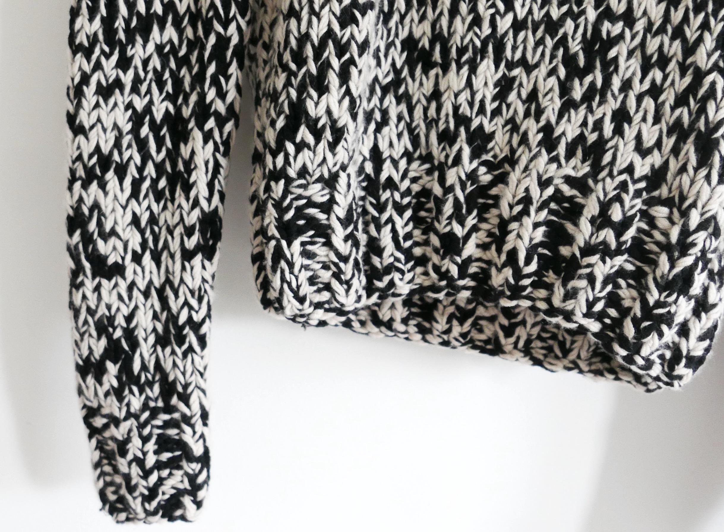Cool and super rare, new with tags Celine cashmere jumper. From the Fall 1999 collection when Michael Kors was at the label. Made from chunky, soft black and white marled cashmere with ribbed trims. It has roomy hood and curved hemline. Size S.