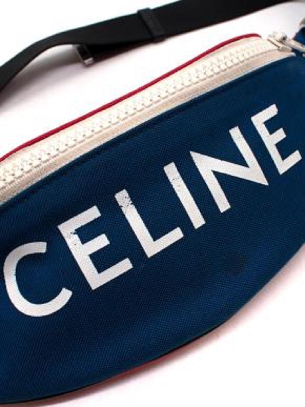 Celine XL Nylon Logo Canvas Belt Bag

- Adjustable and multi-wearable strap
- Zipped compartment
- White zipper
- One main compartment with one slip pocket
- Logo print on canvas
- Chain detailing on zipper

Material
Canvas

Made in France

9.5/10