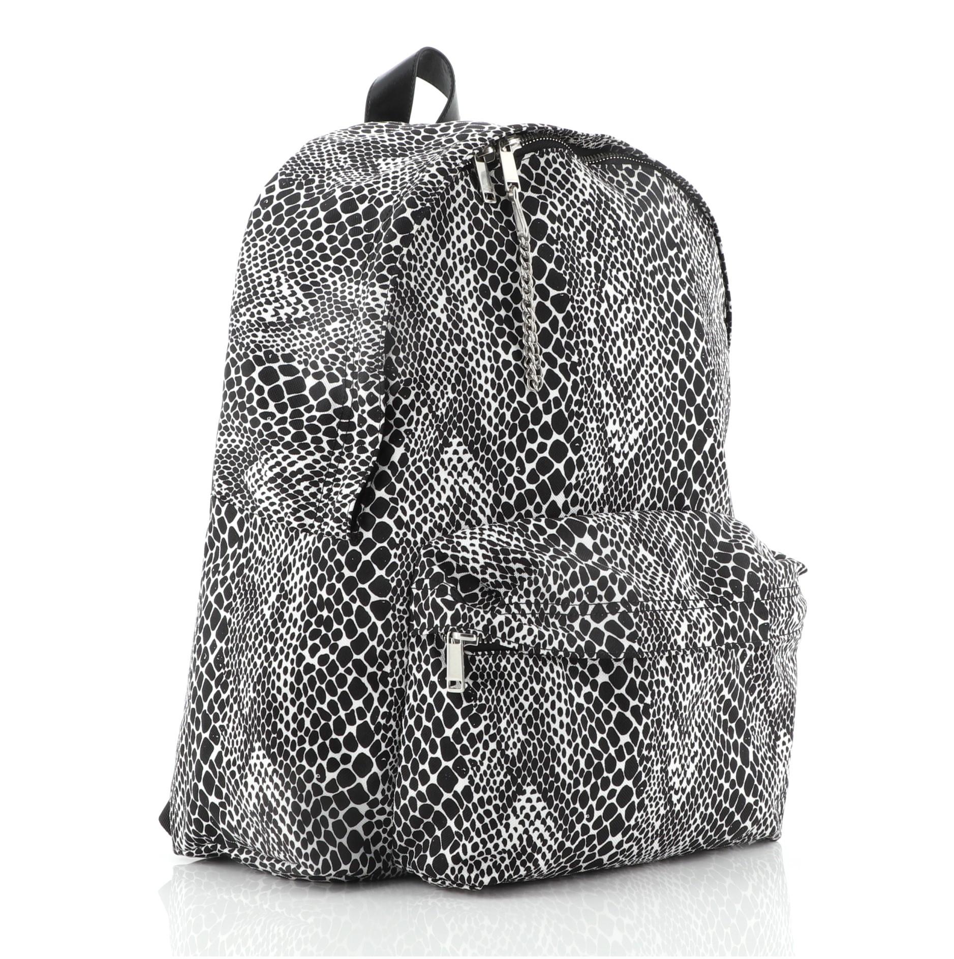 Celine Zip Around Backpack Printed Canvas Medium
Black, Print, White

Condition Details: Creasing and light wear on exterior and in interior, scratches on hardware.

50144MSC

Height 17