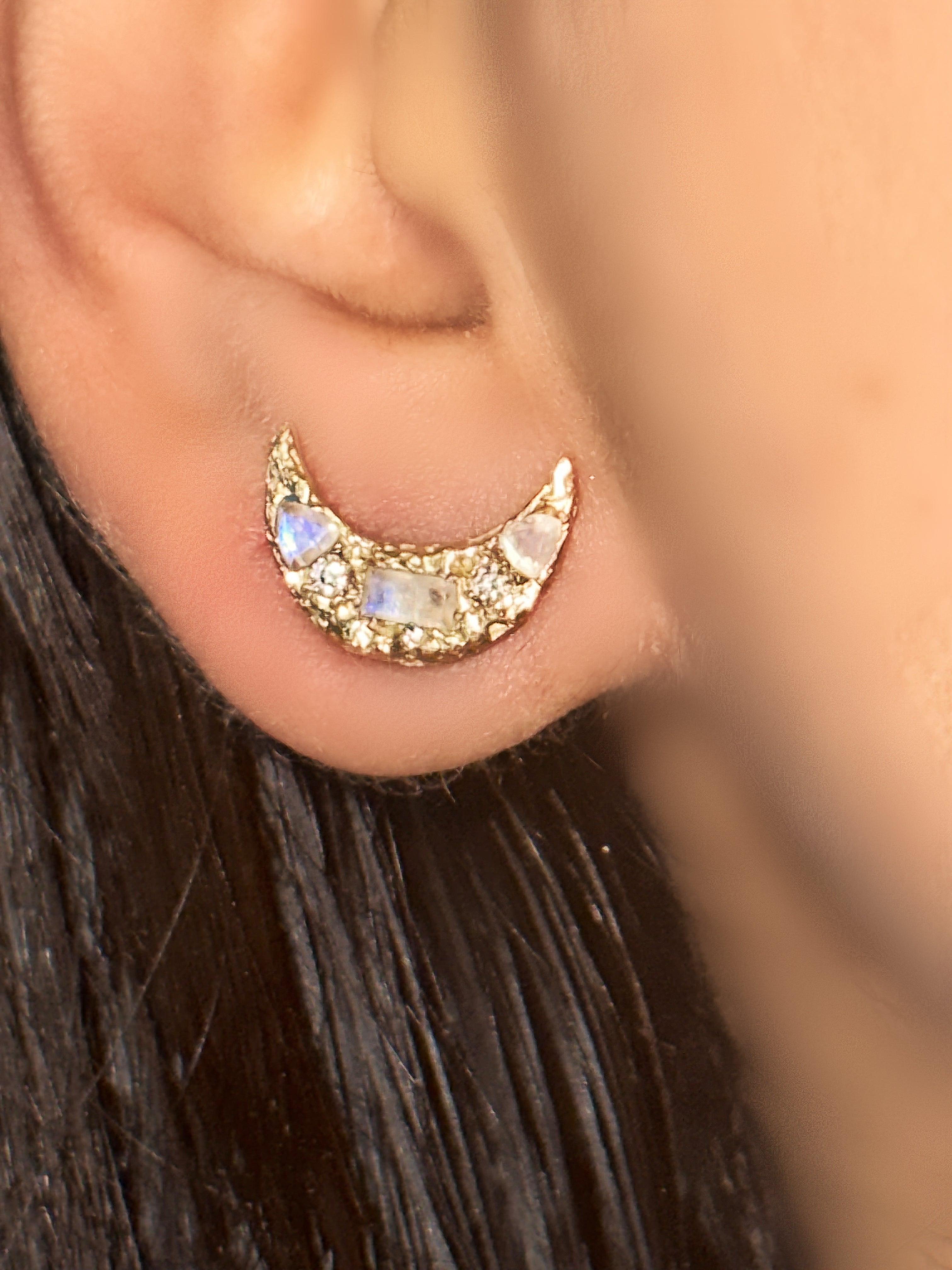 Introducing our exquisite Celini one-of-a-kind large moon stud earrings, meticulously crafted to captivate the hearts of moon enthusiasts and jewelry connoisseurs alike.

Handcrafted, these celestial-inspired earrings are adorned with diamonds and