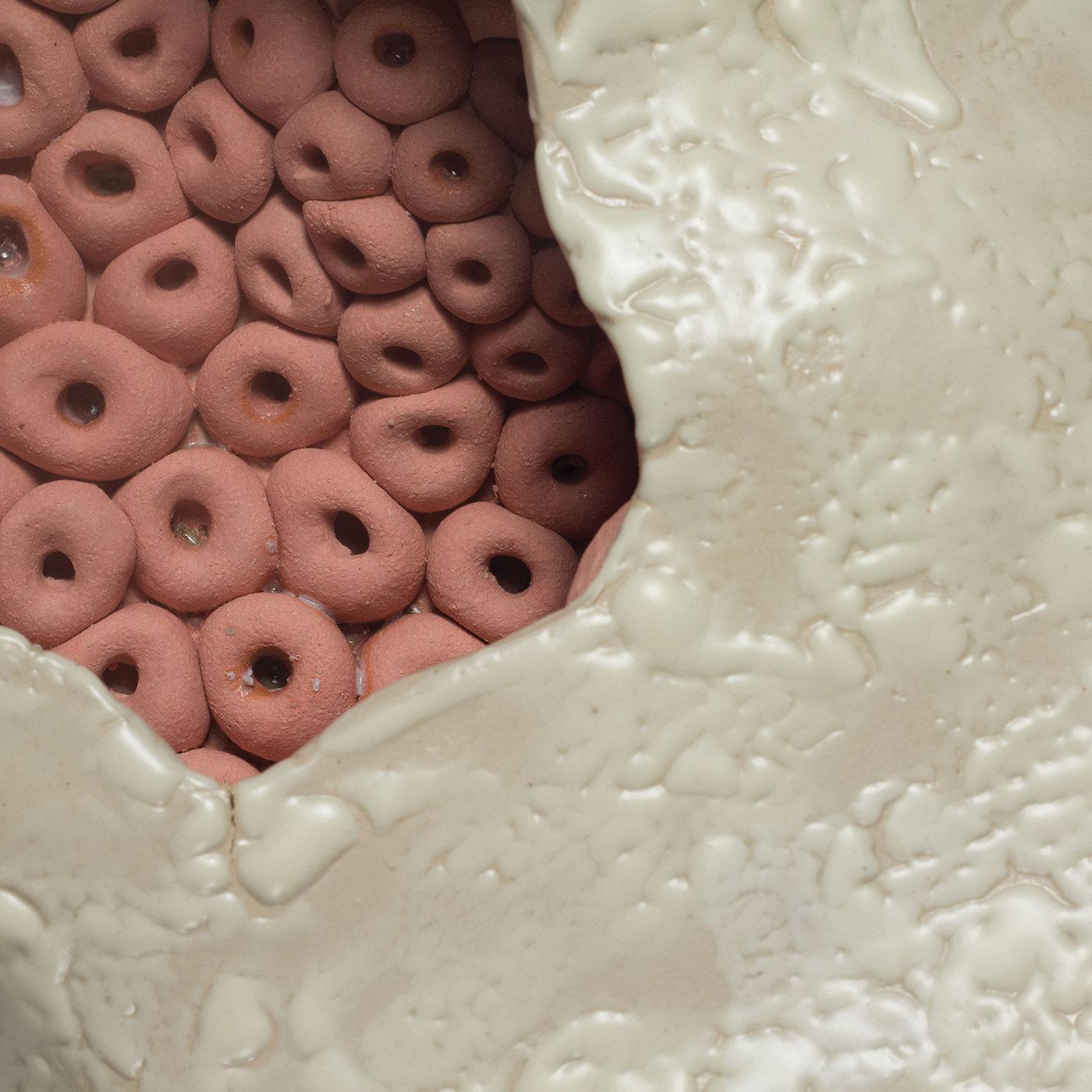 Nature’s unlimited variety of shapes and textures serve as the main inspiration for the exclusive Cell sculpture series by ceramist Angelica Tulimiero. Entirely crafted and decorated by hand using mixed techniques, the organic, irregular shape of