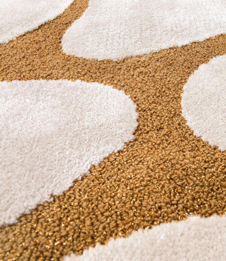 The Human body is composed of different types of cells. This indoor rug will be the body of your dining room, bringing together all the other design cells in one perfect design body. CELL is a hand-tufted rug that combines the grandiosity of three