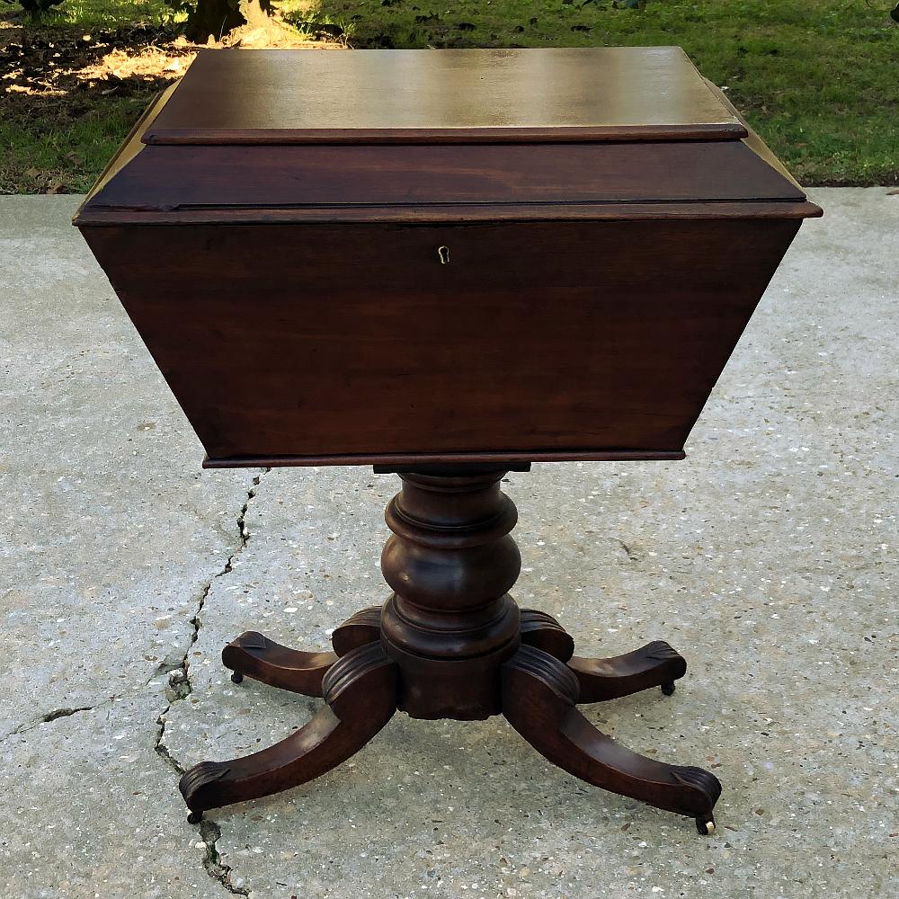 Cellarette, 19th century English Regency Period wine server in mahogany was designed for keeping chilled wine in the entertaining room, but makes an interesting conversation piece as well. Handcrafted with the utmost in artisanry from solid imported