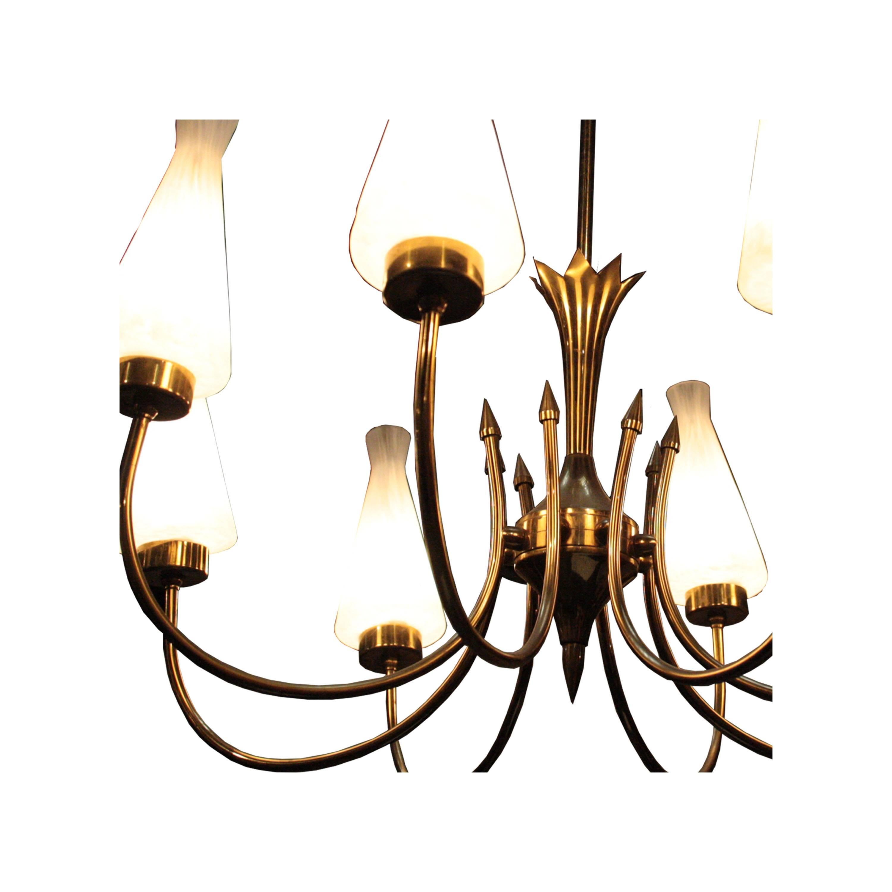 Ceiling lamp brass structure with eight points of light. Glass tulips molded by hand.