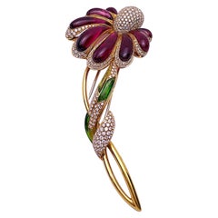 Cellini Broche fleur en or 18 carats, diamants, rubellite et tourmaline verte