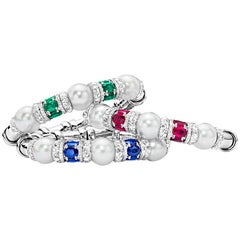 Cellini 18 KT White Gold, 4Ct. Emerald, Diamond and South Sea Pearl Bracelet