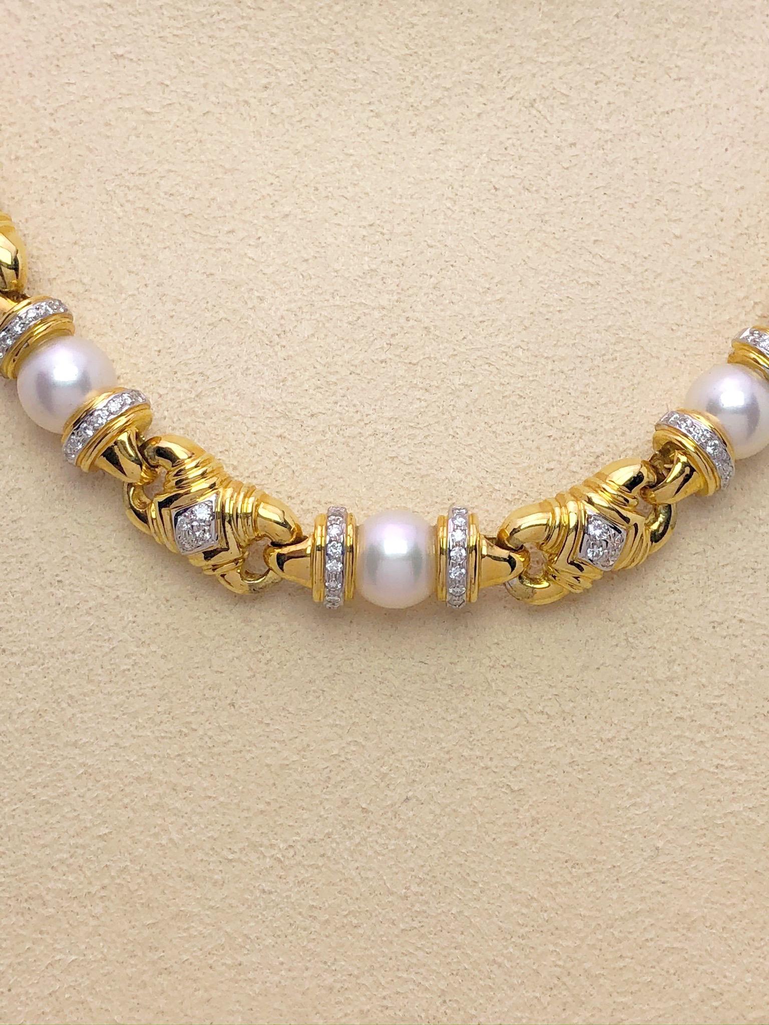 This beautiful and wearable 18kt yellow gold and pearl necklace is further enhanced with brilliant diamonds.
This chic necklace, composed with 12 cultured pearls and 1.98cts of white brilliant diamonds, is the perfect accessory for any attire. 
The