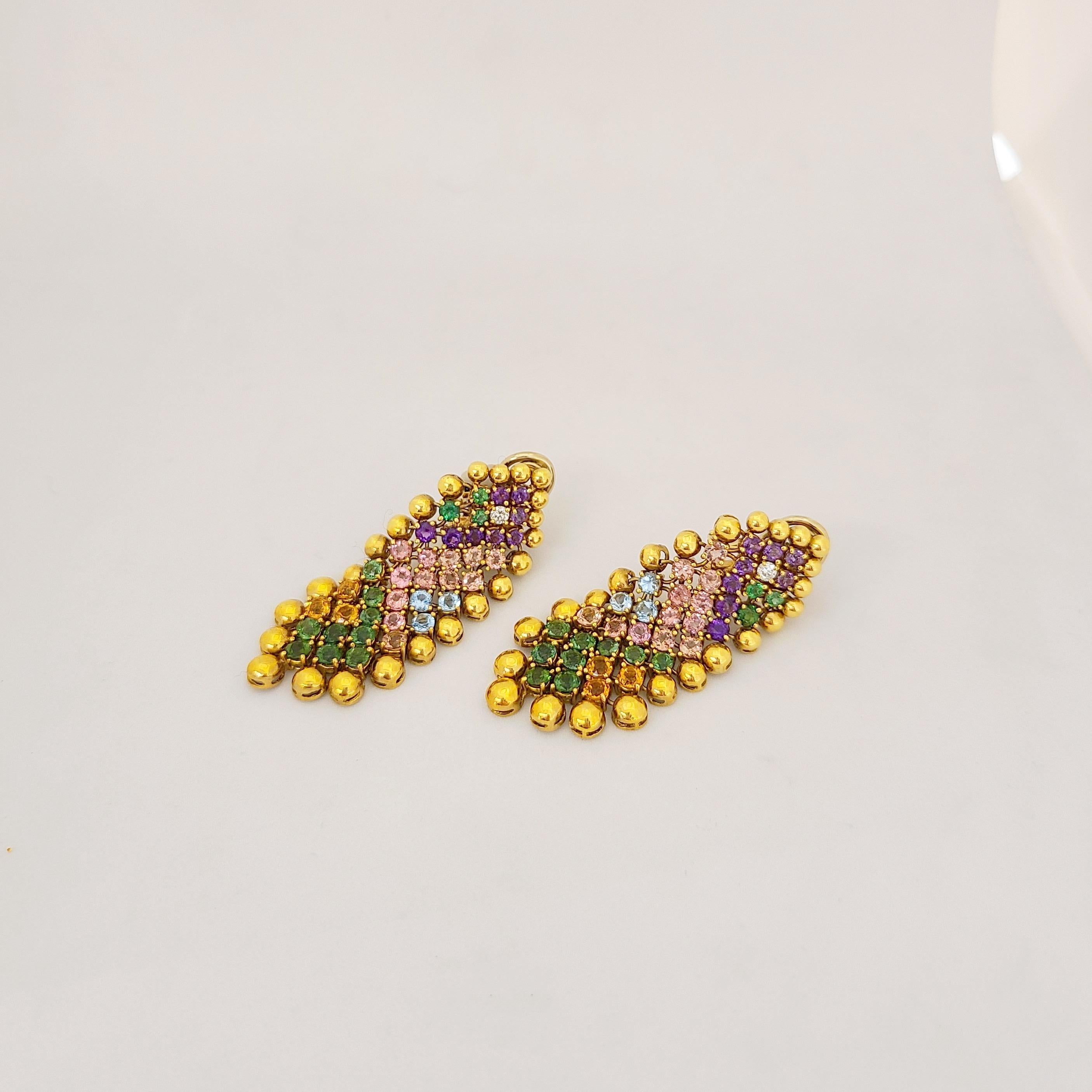 Cellini Jewelers Nyc, fun flexible earrings feature 9.69Ct. of semi precious gems set on 18 karat Yellow Gold flexible mesh. The gems are surrounded by graduating 18 karat yellow gold beads. 
Earrings measure 2