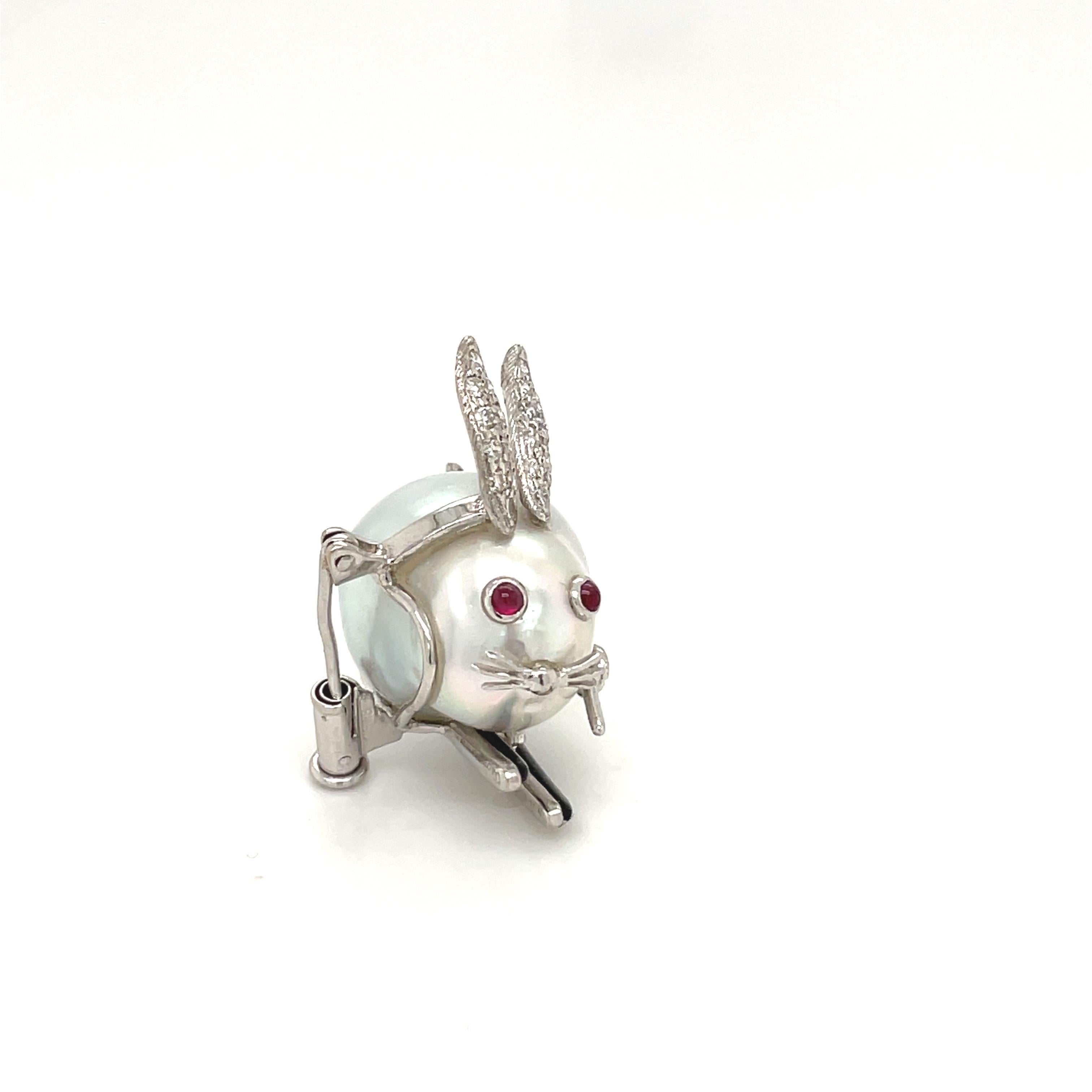 Contemporary Cellini 18K White Gold Baroque Pearl Ski Bunny Brooch with Diamonds and Rubies For Sale