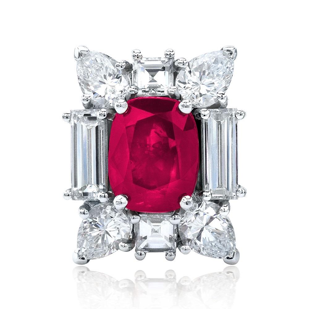 Oval-shaped rubies surrounded by a squared entourage of baguette and pear-shaped diamonds. Set in 18-karat white gold.
Burmese ruby weight: 5.54 carats total. Diamond weight: approximately 5.14 carats total.
These earring are clip back, a post can