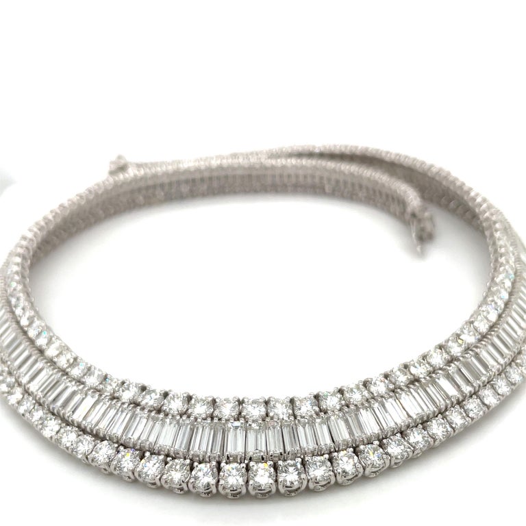 Cellini NYC presents this magnificent 18 karat white gold and diamond classic collar necklace.
 The necklace is designed with a center row of 189 baguette cut diamonds with a total diamond weight of 31.58 carats. Two rows of 271 round brilliant