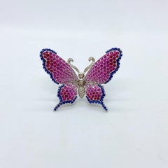 Cellini 18 Karat White Gold, Diamond, Pink and Blue Sapphire Butterfly Brooch