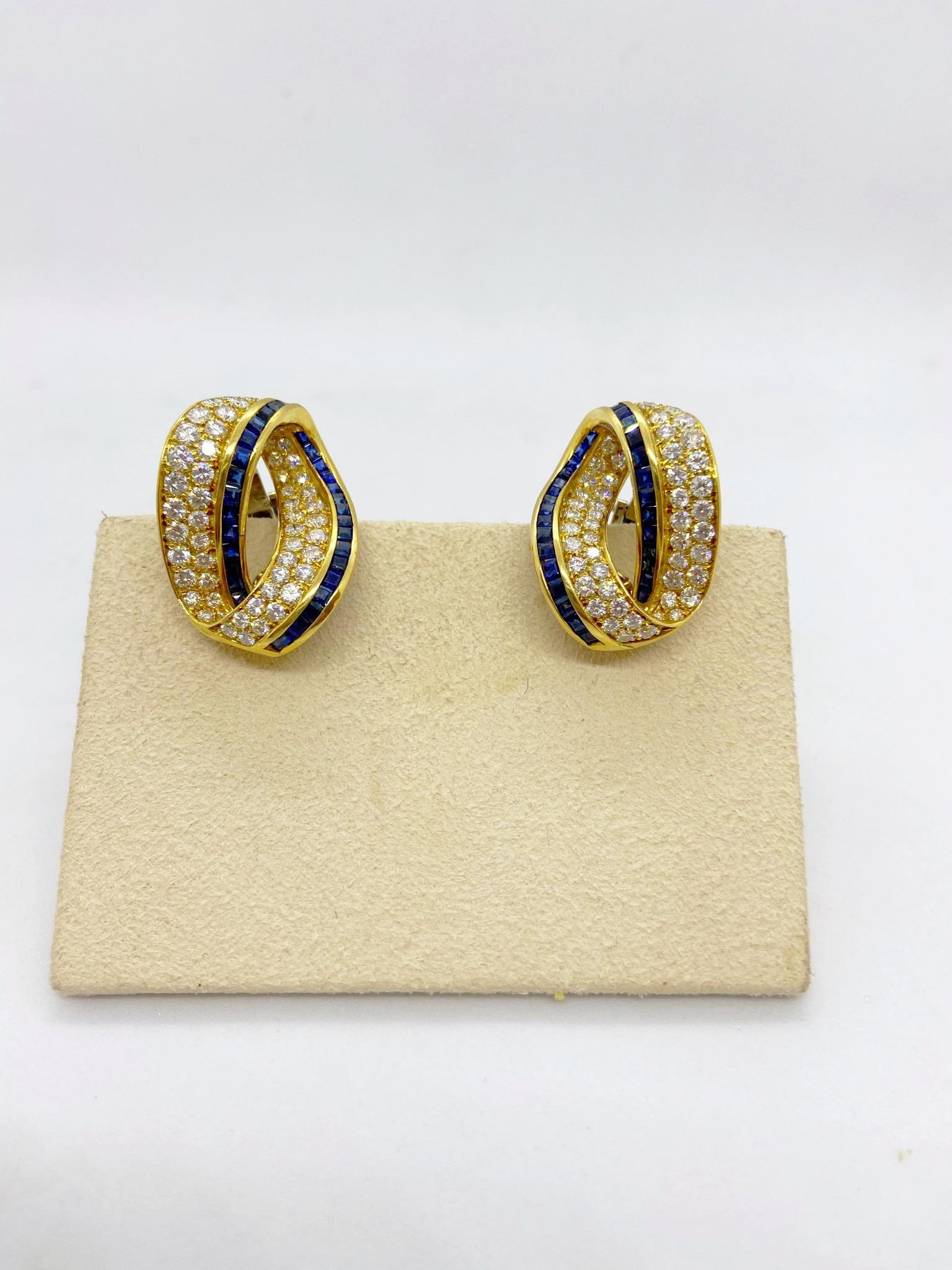 Contemporary Cellini 18KT Gold 2.39 Carat Diamond and 2.59 Carat Sapphire Infinity Earrings For Sale