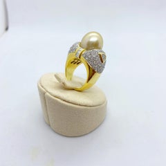 Anello Cellini in oro giallo 18 carati, diamante da 3,60 carati e perla dorata dei mari del sud