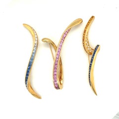 Cellini Schleifenbrosche, 18kt Gelbgold 4,12 Karat rosa Saphir