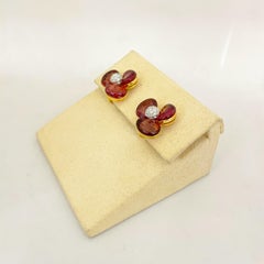 Cellini: 3 Blütenblatt-Ohrringe aus 18 Karat Gelbgold mit rosa Turmalin und 0,40 Karat