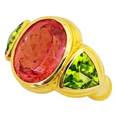 Anello Cellini in oro giallo 18KT con rubellite da 8,05 carati e peridoto da 3,46 carati