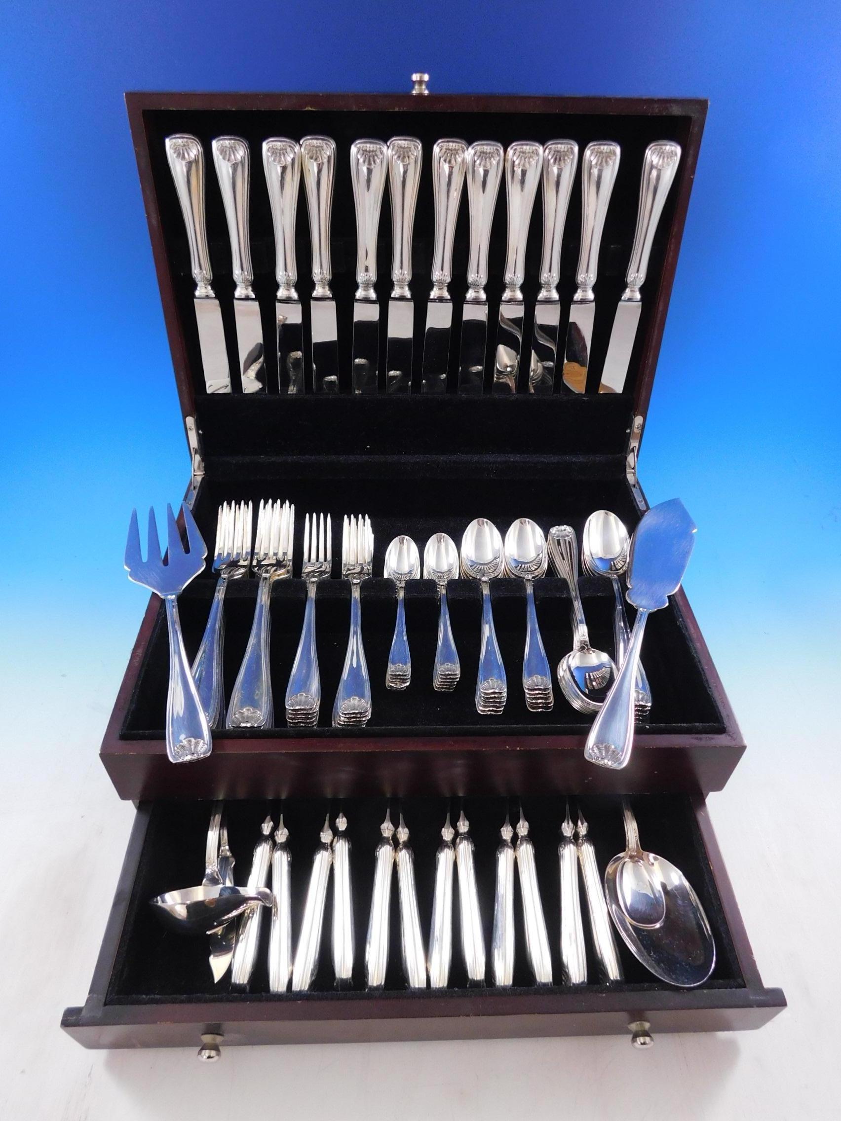 Continental size Cellini by Fortunoff Italy shell motif sterling silver flatware set, 90 pieces. This set includes:

12 continental size knives, 9 1/2