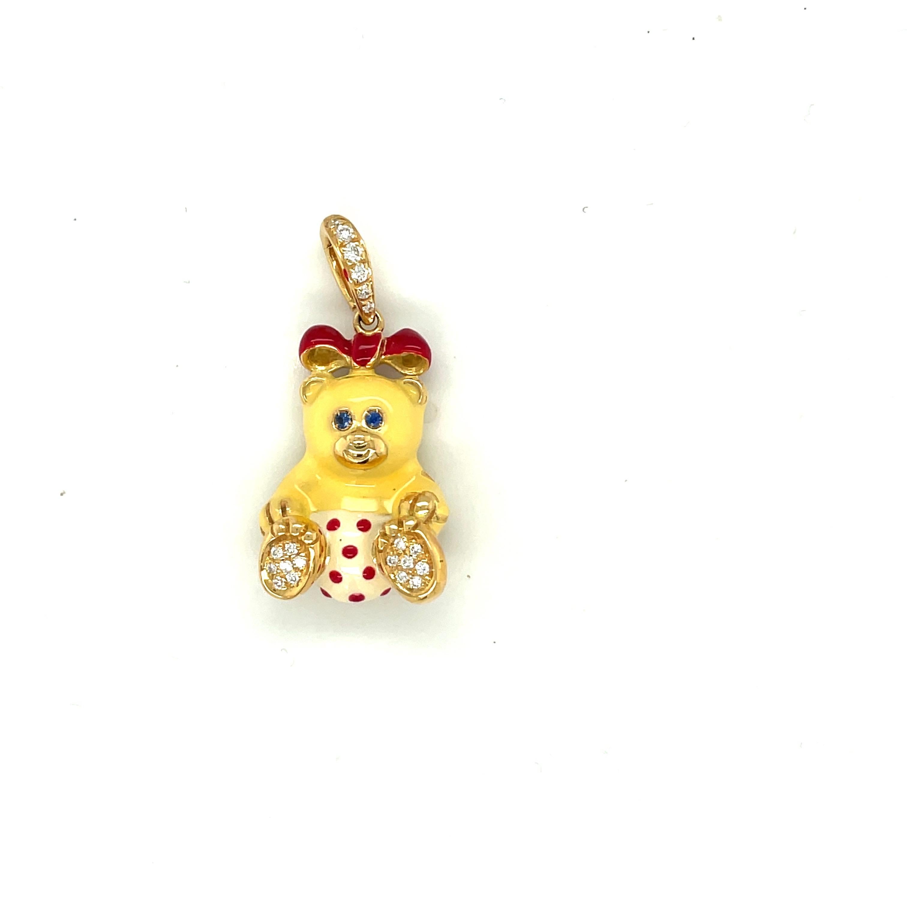 Just the cutest....Teddy bear charm made exclusively for Cellini by Ambrosi of Italy.

This 18 karat yellow gold teddy bear is set with round brilliant pave diamonds on her paws . She has blue sapphire eyes . Her body is yellow enamel and her outfit