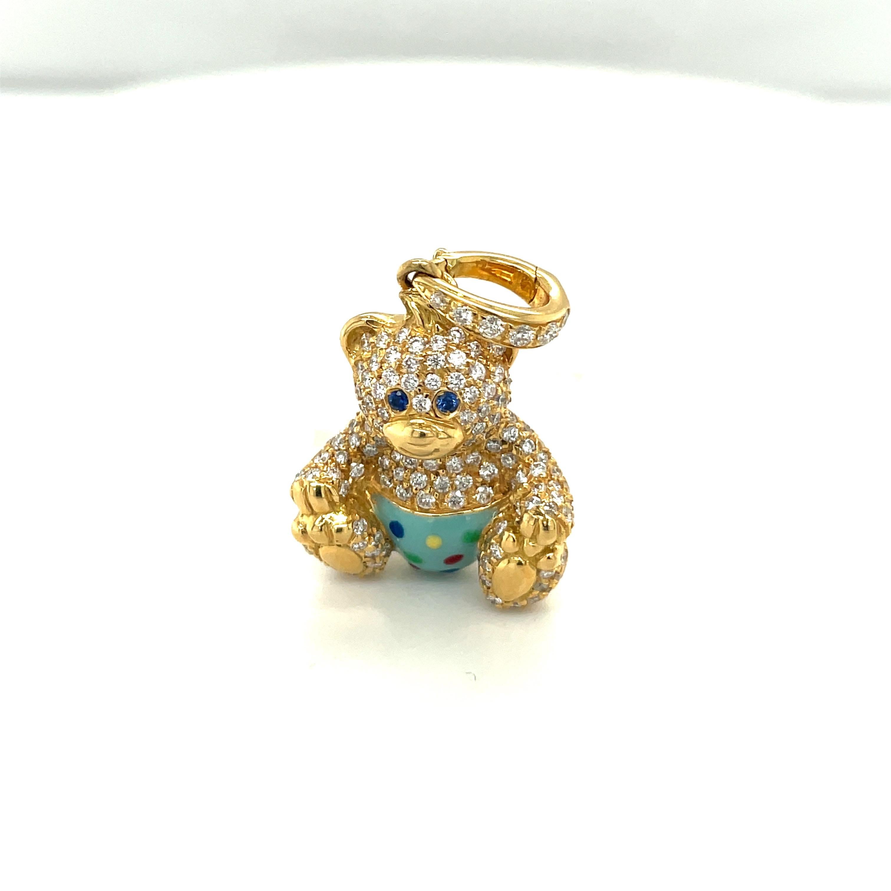 Just the cutest....Teddy bear charm made exclusively for Cellini by Ambrosi of Italy.

This 18 karat yellow gold teddy bear is fully set with round brilliant pave diamonds. He has blue sapphire eyes . He wears a light blue enamel diaper with multi