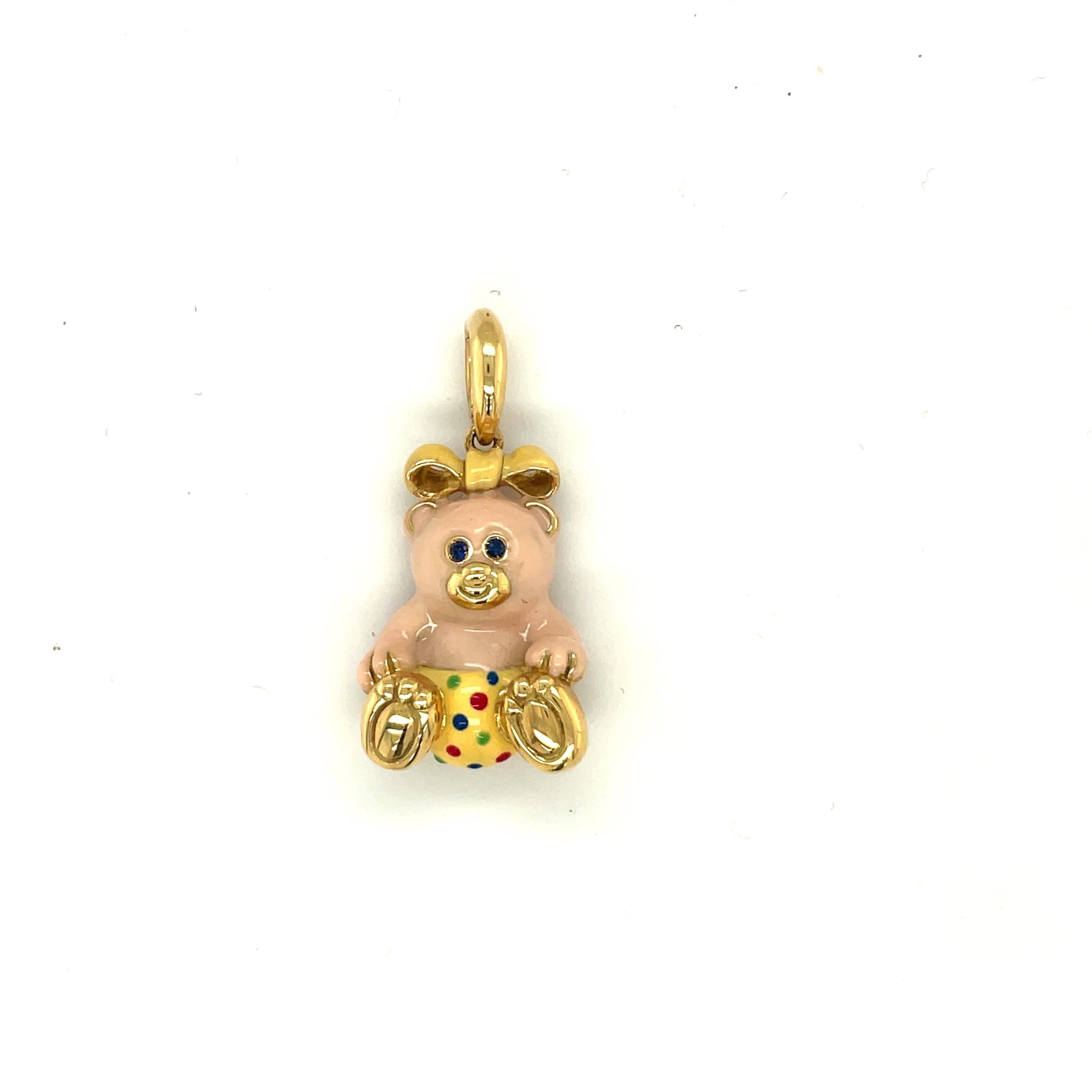 Just the cutest....Teddy bear charm made exclusively for Cellini by Ambrosi of Italy.

This 18 karat yellow gold teddy bear charm is crafted with a light pink enamel for the body. Her outfit is a soft yellow with red, blue, and green polka dots. She