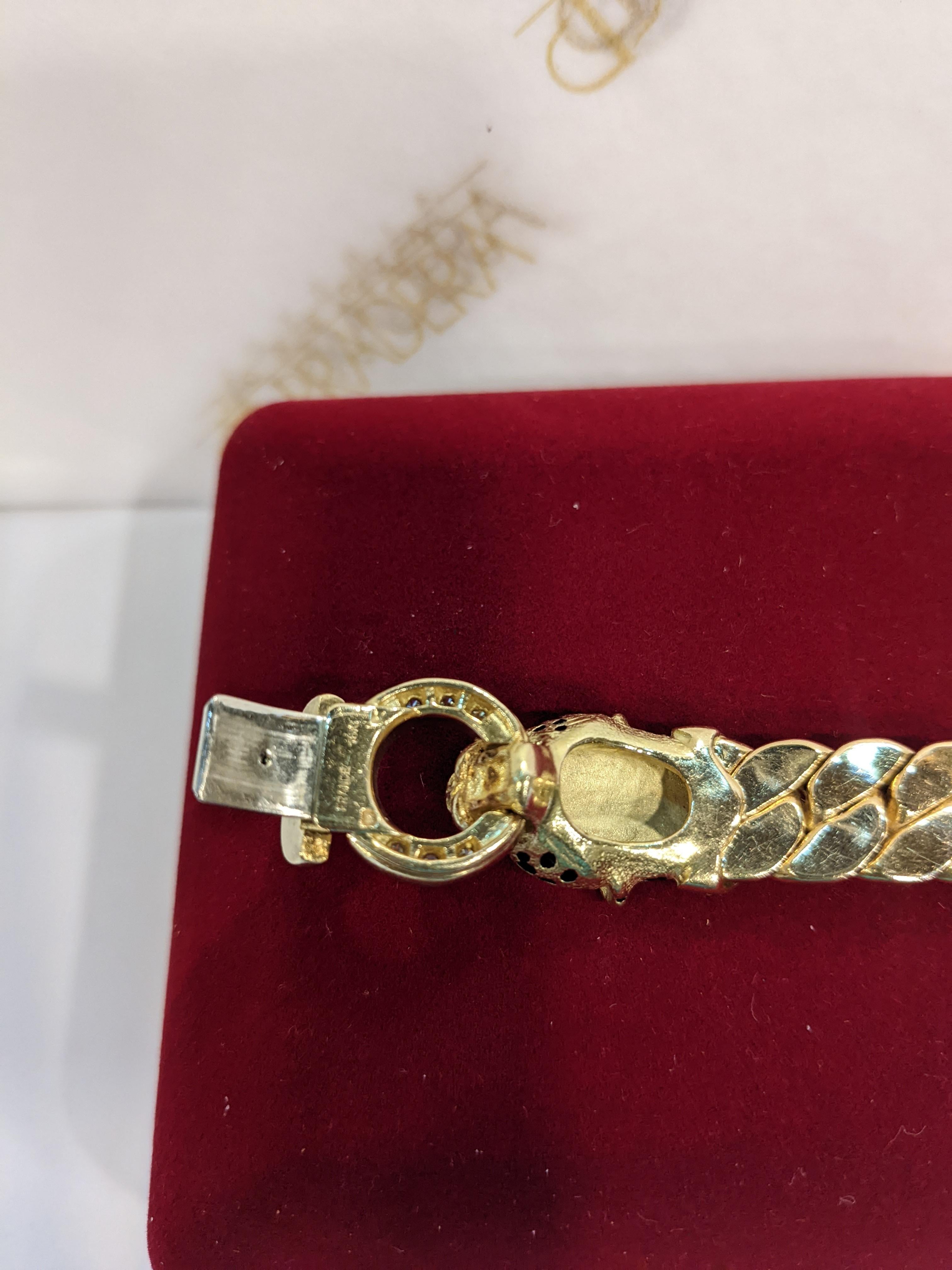 Cellini France 90´s Yellow Gold, diamonds, emerald and enamel panthere bracelet For Sale 1