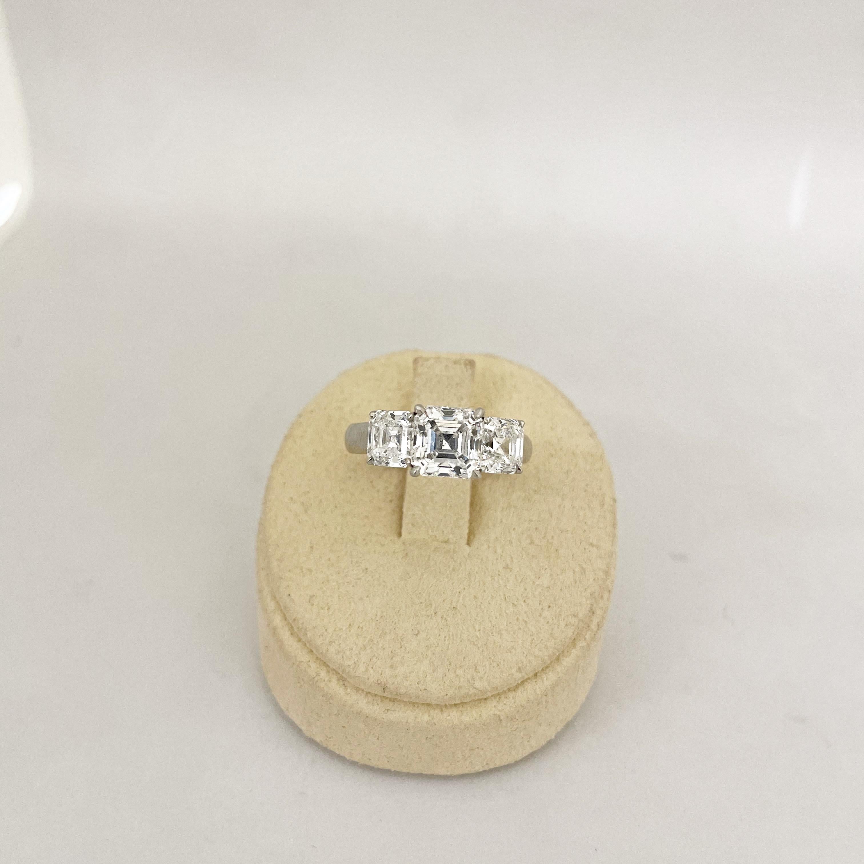 Cellini GIA Certified 3 Stone Square Emerald Cut E color Diamond Ring For Sale 6