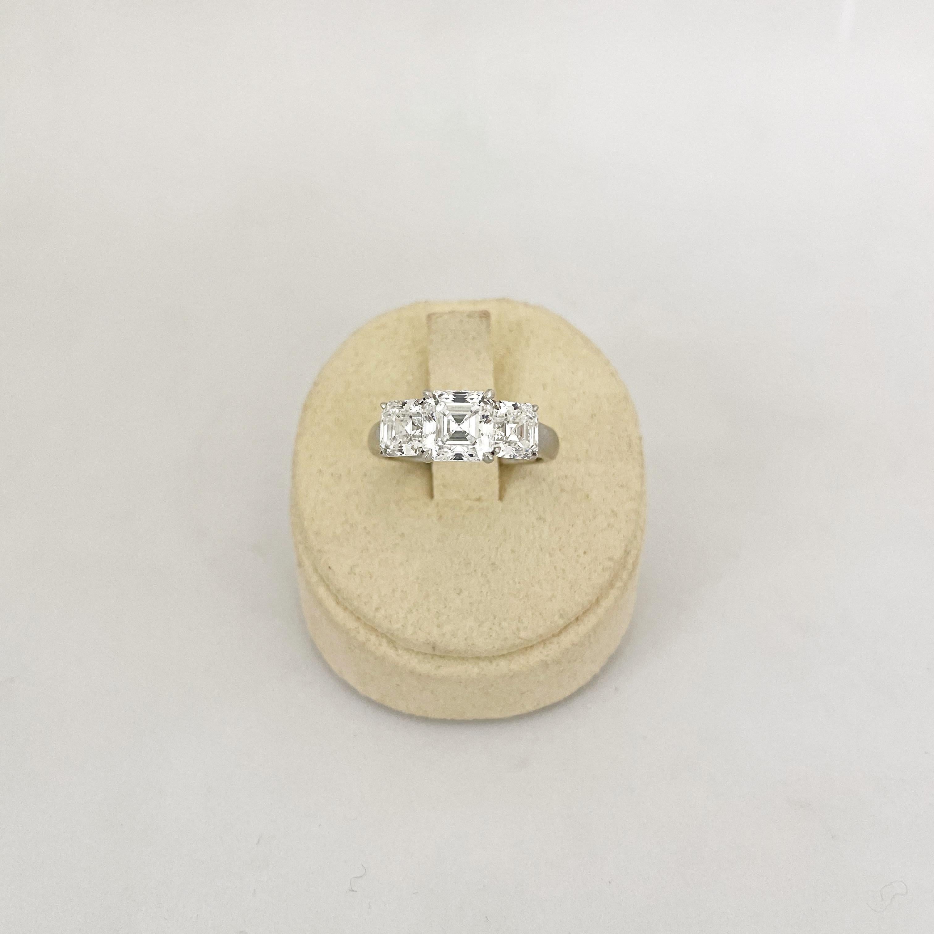Cellini GIA Certified 3 Stone Square Emerald Cut E color Diamond Ring For Sale 7