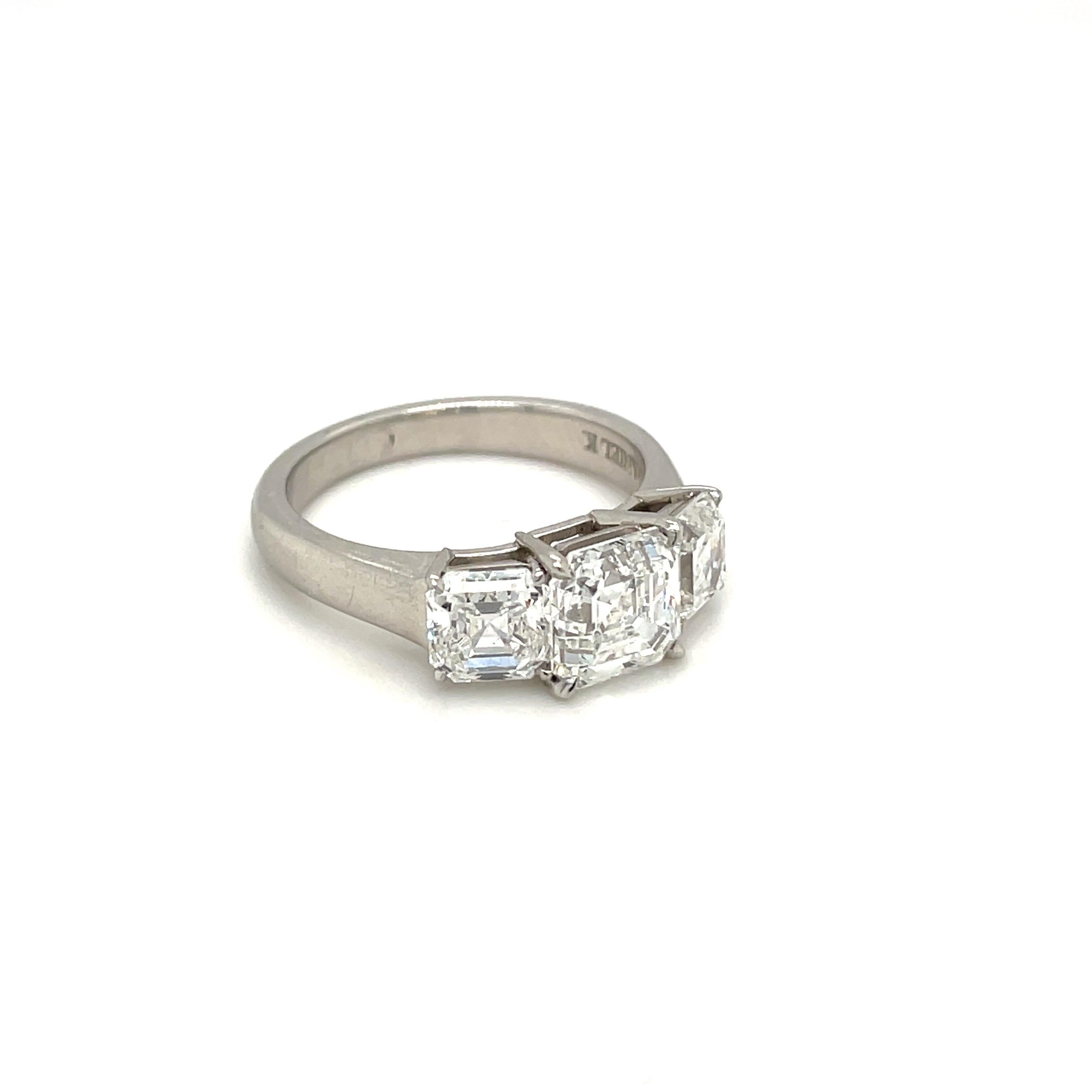 Cellini GIA Certified 3 Stone Square Emerald Cut E color Diamond Ring In New Condition For Sale In New York, NY