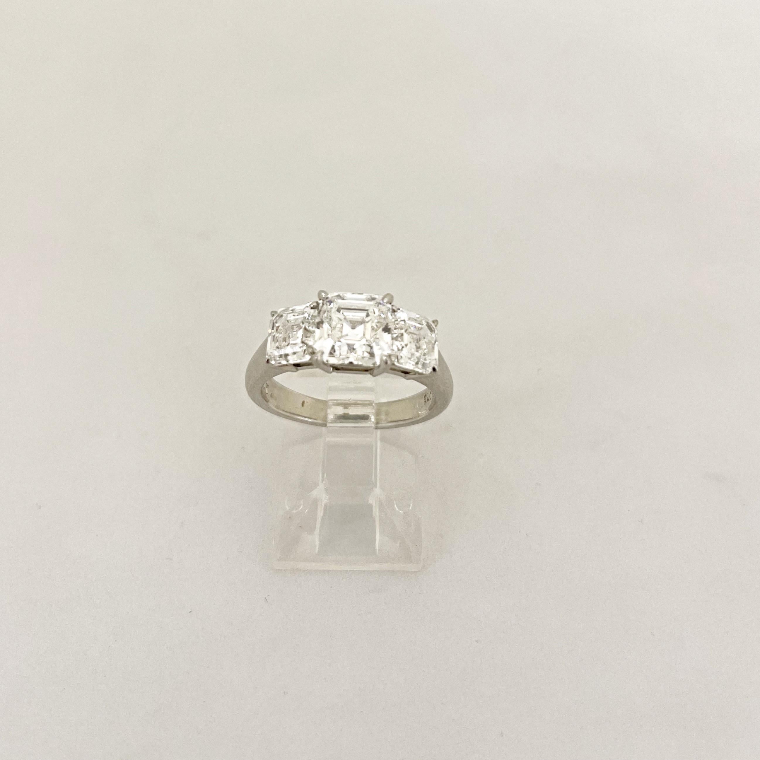 Cellini GIA Certified 3 Stone Square Emerald Cut E color Diamond Ring For Sale 1