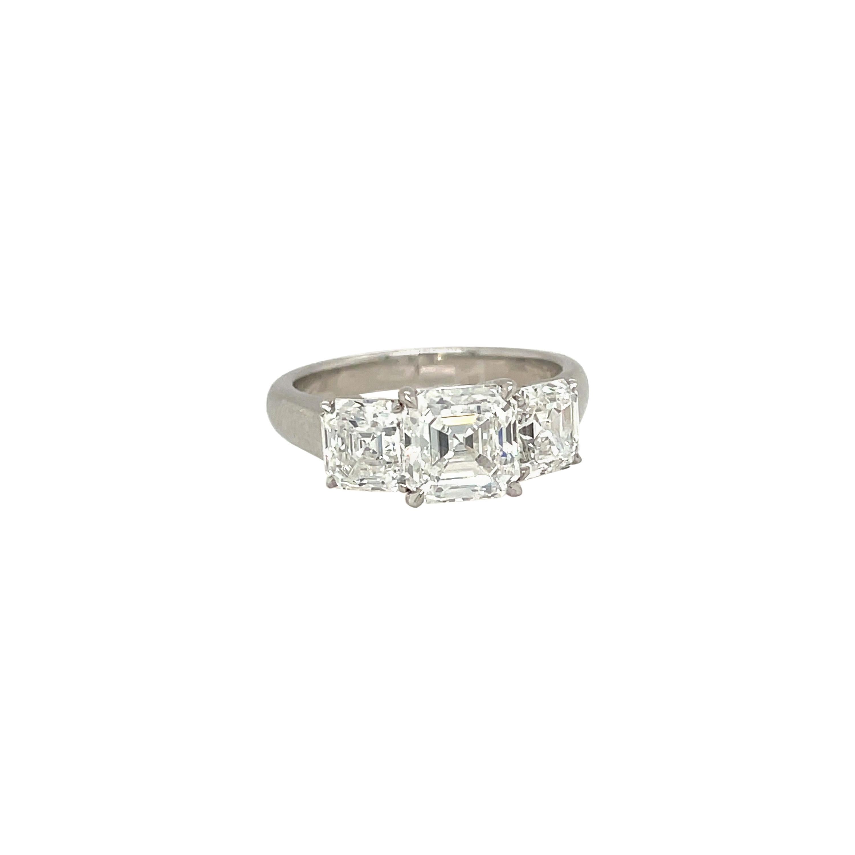 Cellini GIA Certified 3 Stone Square Emerald Cut E color Diamond Ring For Sale