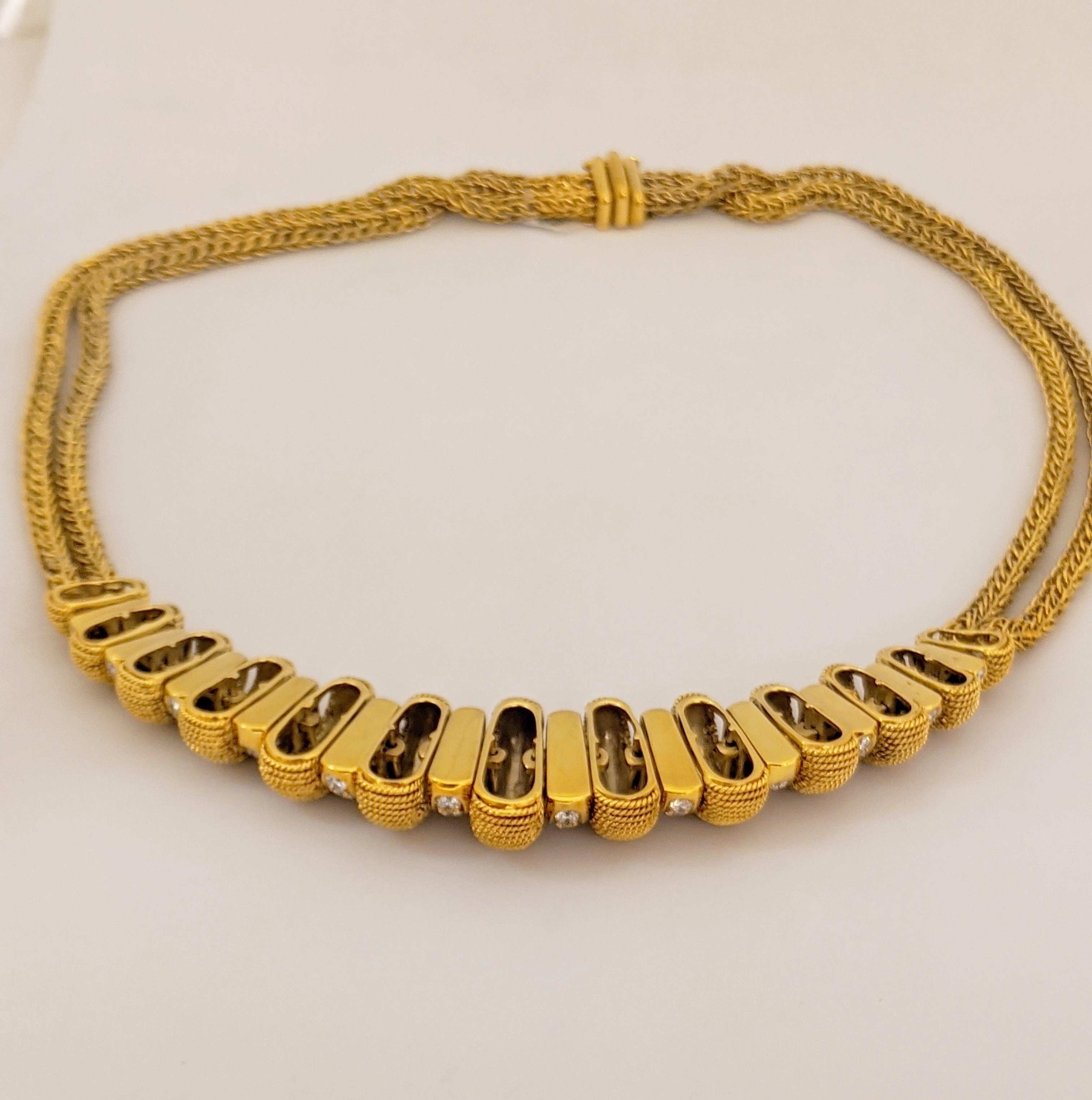 Cellini Jewelers NYC beautifully designed 18 karat yellow gold and diamond necklace. The front portion of this necklace is designed with  6