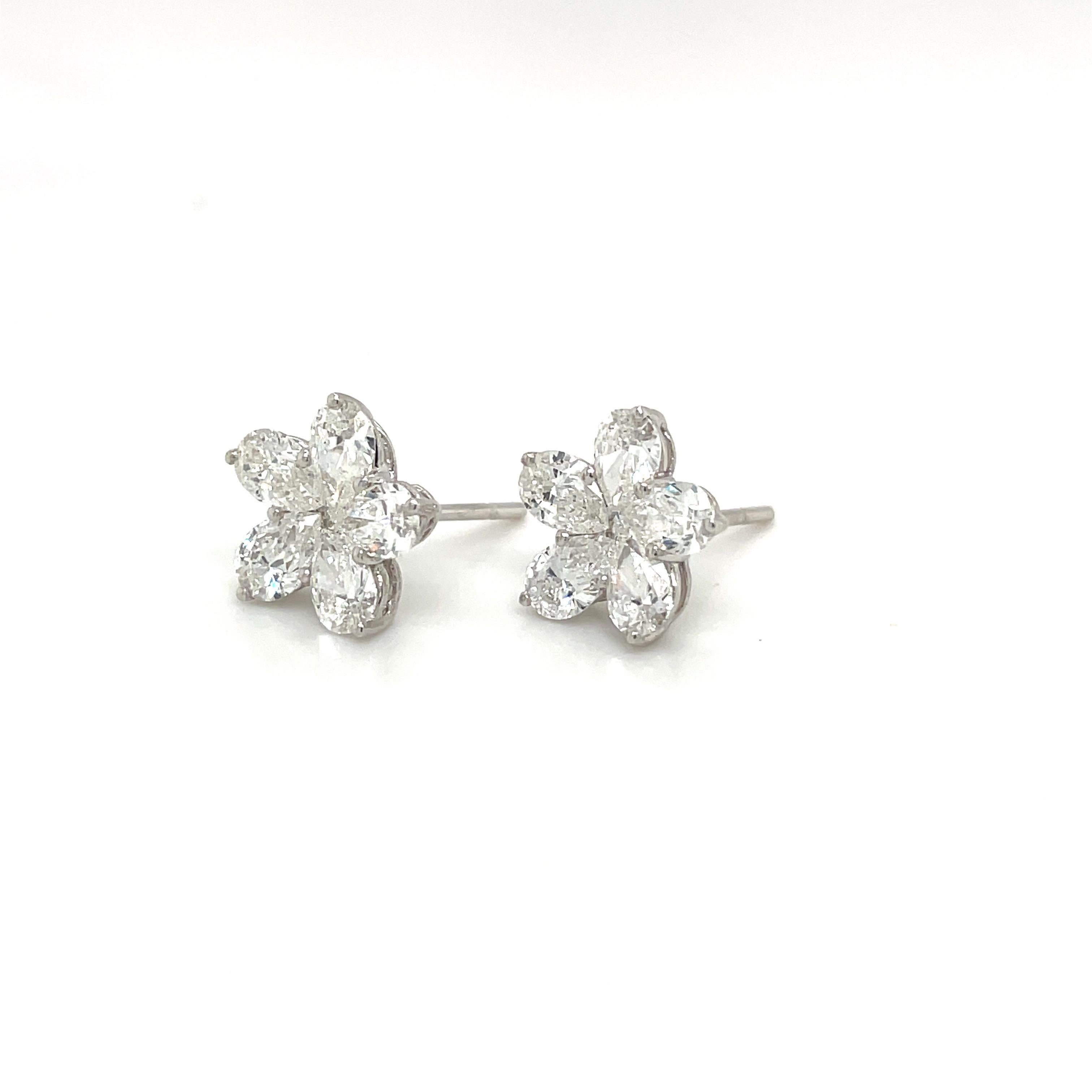 Pear Cut 18kt White Gold 2.42ct Pear Shaped Diamond Flower Stud Earrings For Sale