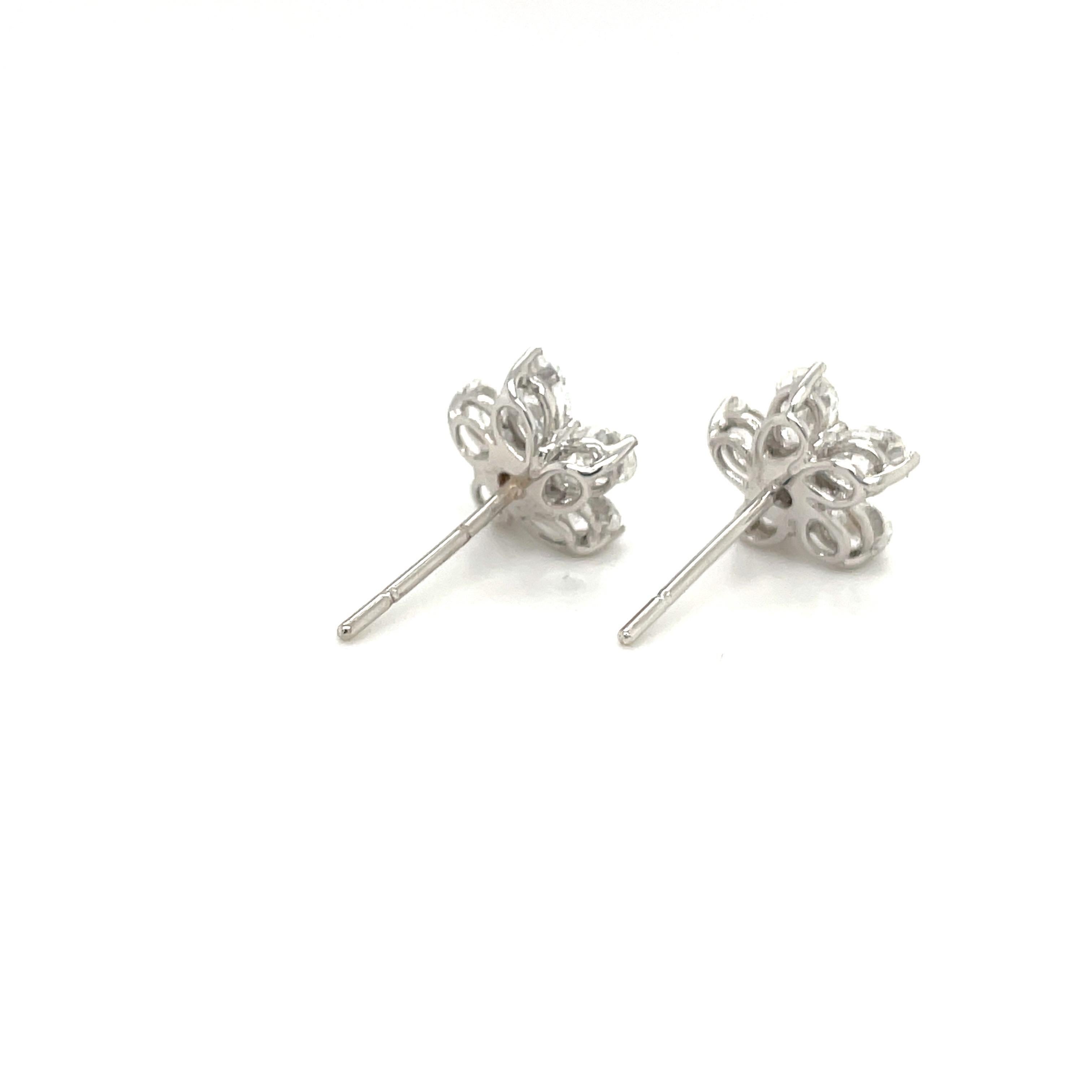 Women's or Men's 18kt White Gold 2.42ct Pear Shaped Diamond Flower Stud Earrings For Sale