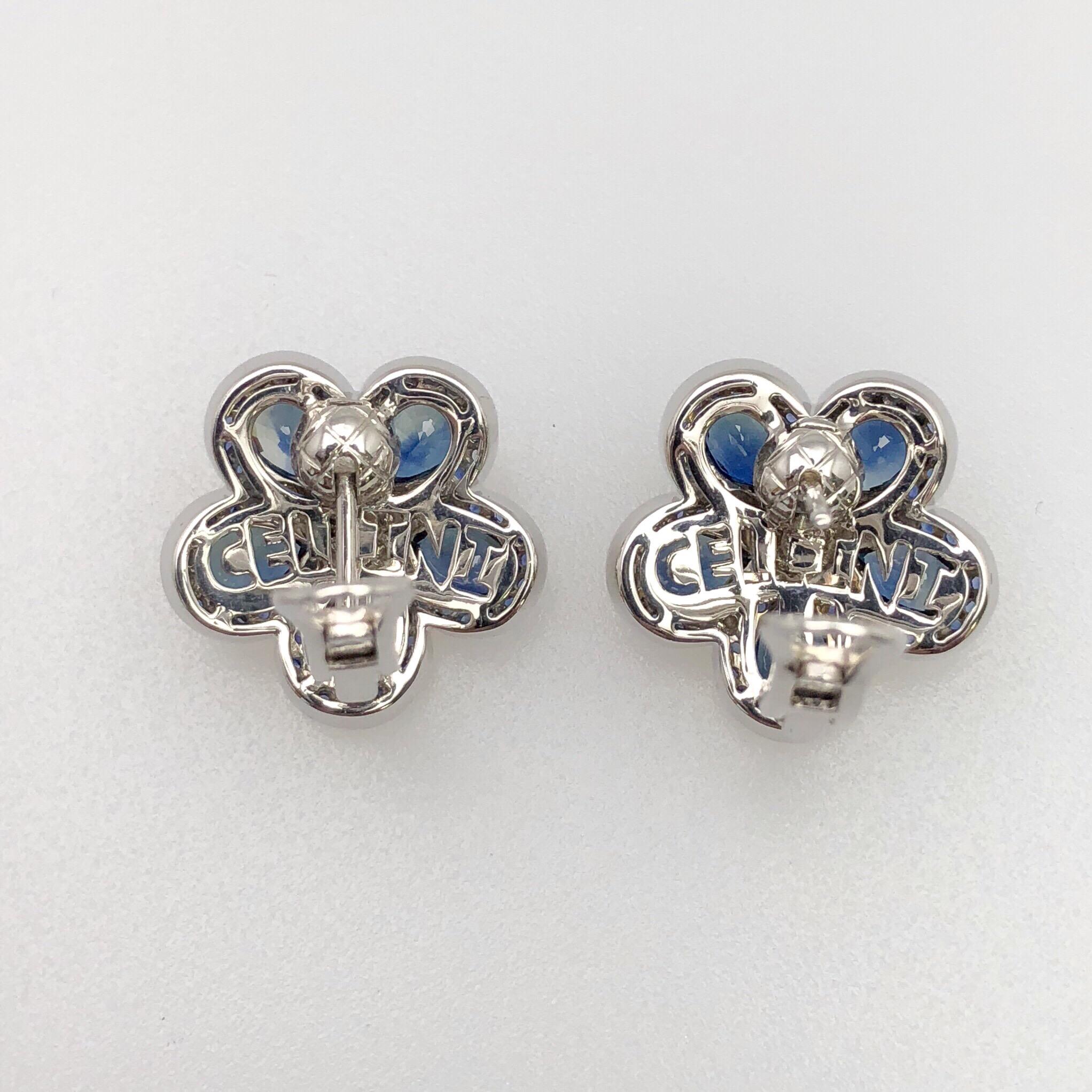 Cellini Jewelers iconic Flower Power earrings. These stunning earrings are composed of five pear shaped blue sapphires, with a round brilliant diamond center. Each petal and center are surrounded with micro pave. The Flower measures approximately