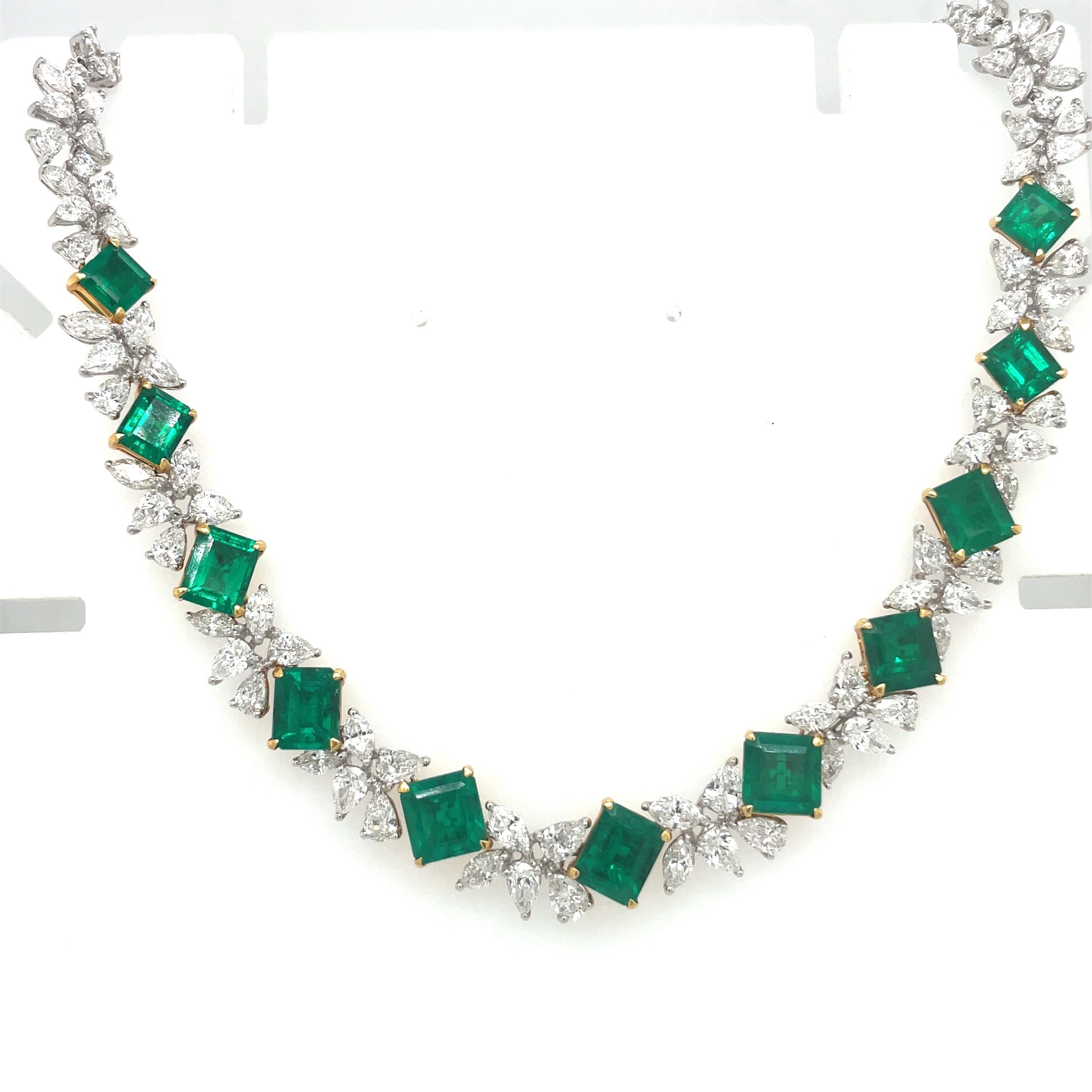 Exceptionally beautiful emerald and diamond necklace. The centerpiece of this necklace is set with 11 square and rectangular emeralds. Round, marquis and pear shaped diamonds encompass the entire 17