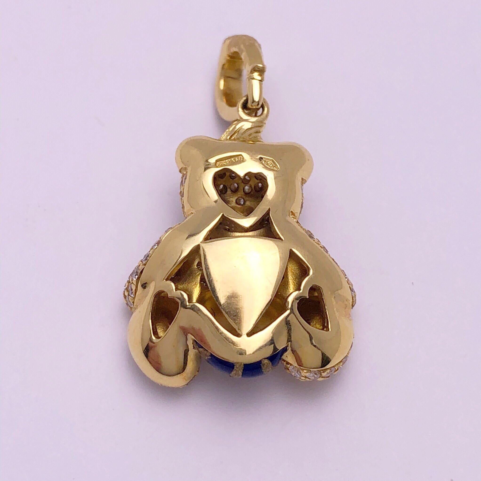 Just the cutest....Teddy bear charm made exclusively for Cellini by Ambrosi of Italy.
This 18 karat yellow gold teddy bear is fully set with 1.07 carats of round brilliant diamonds, including the diamond bale. He has blue sapphire eyes and his