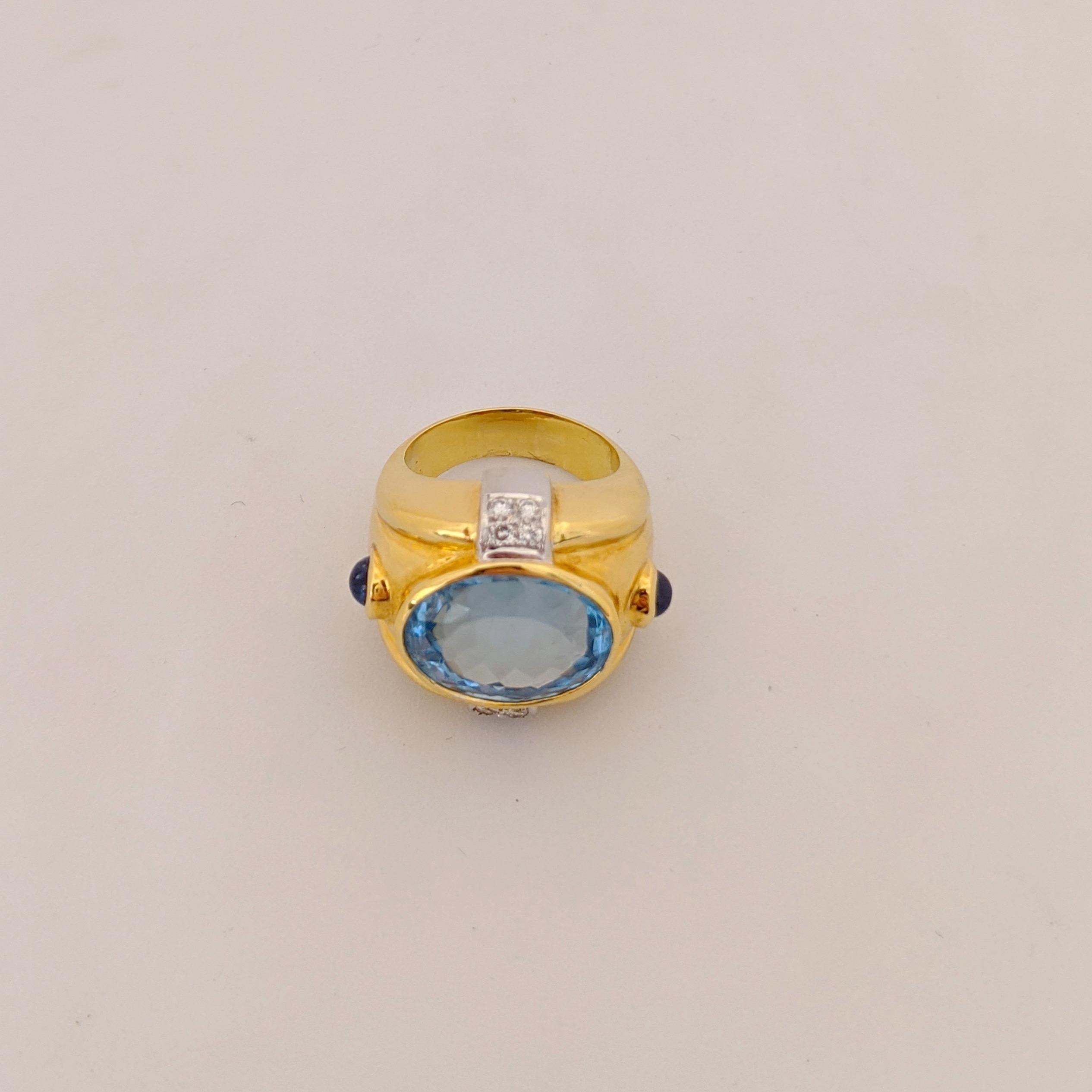 18 Karat Yellow Gold and 12.23 Carat Oval Blue Topaz Ring 3