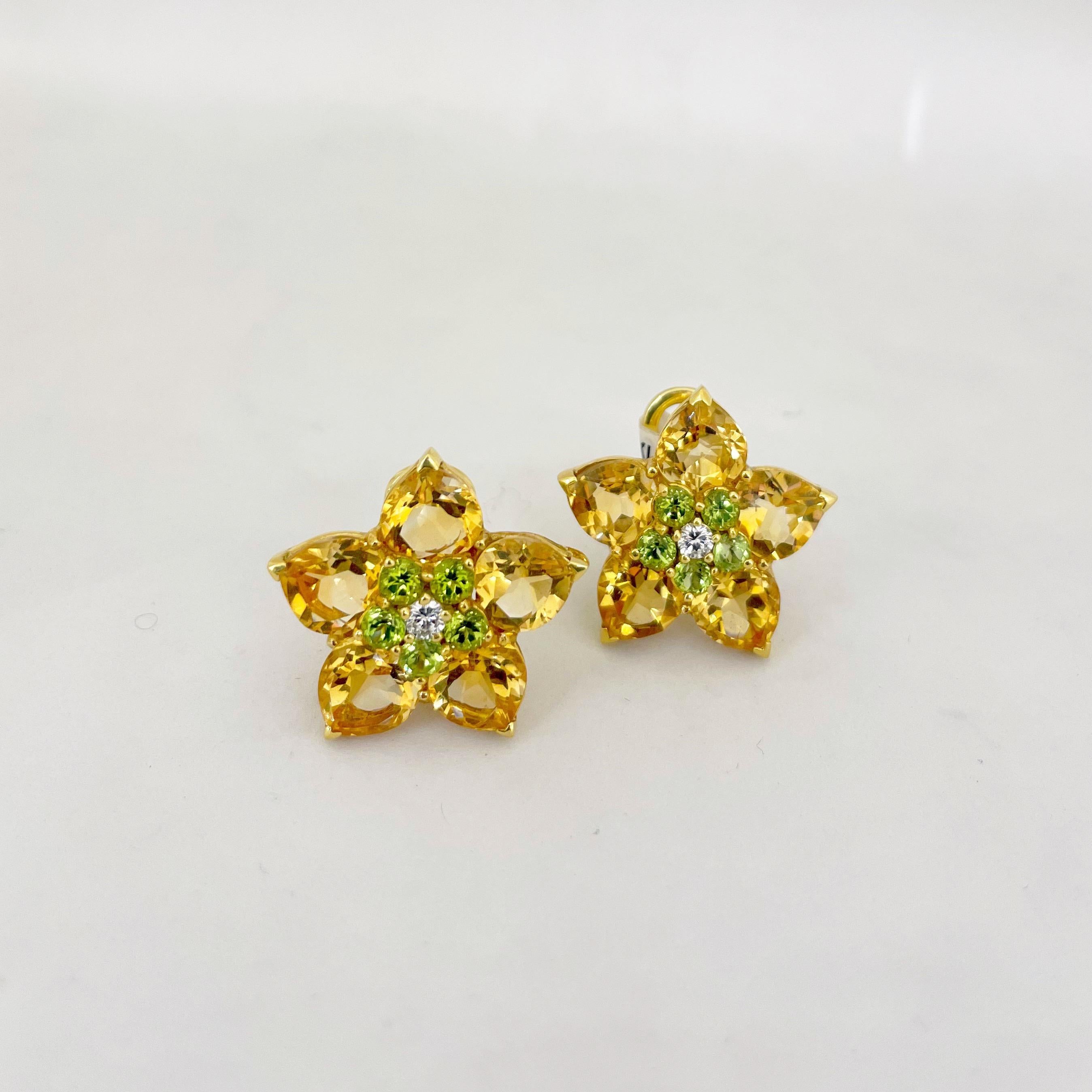 Designed by Barzizza of Valenza, Italy, for Cellini NYC, founded in 1958 the firm produces very limited series of unique jewelry pieces.
These flower earrings are artistically designed with pear shaped citrine petals and round brilliant peridots.