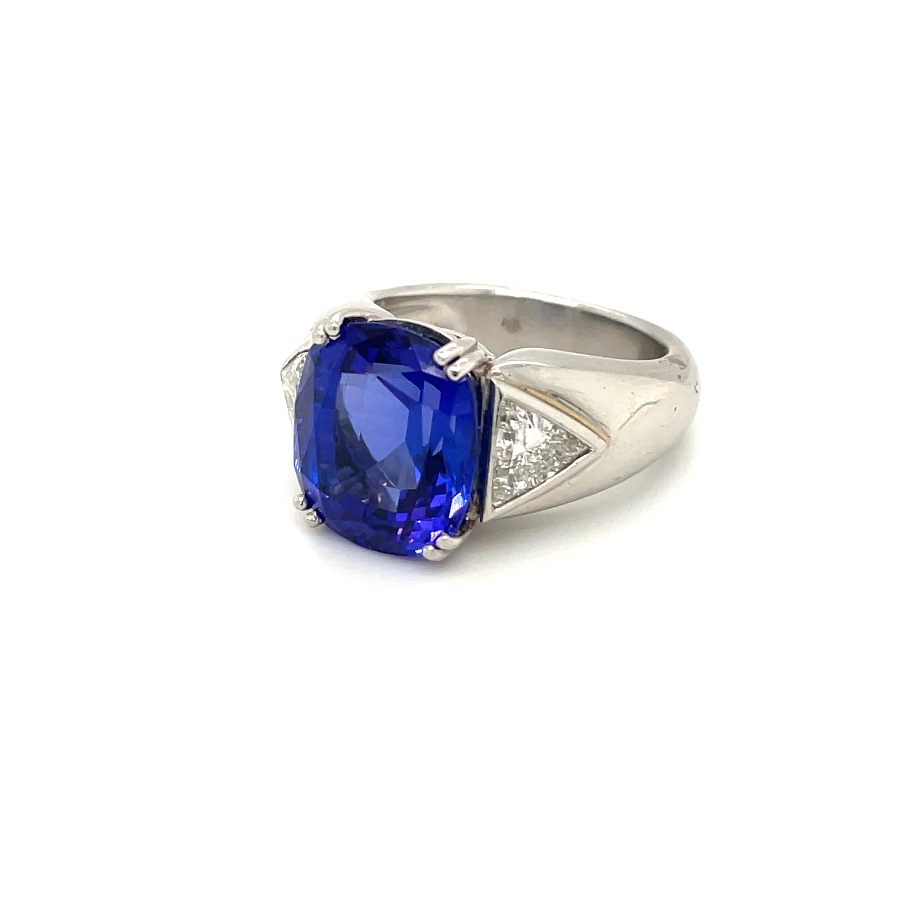 Women's or Men's Cellini Jewelers 9.51C.T Tanzanite Ring with Diamond Side Stone Set in Platinum For Sale